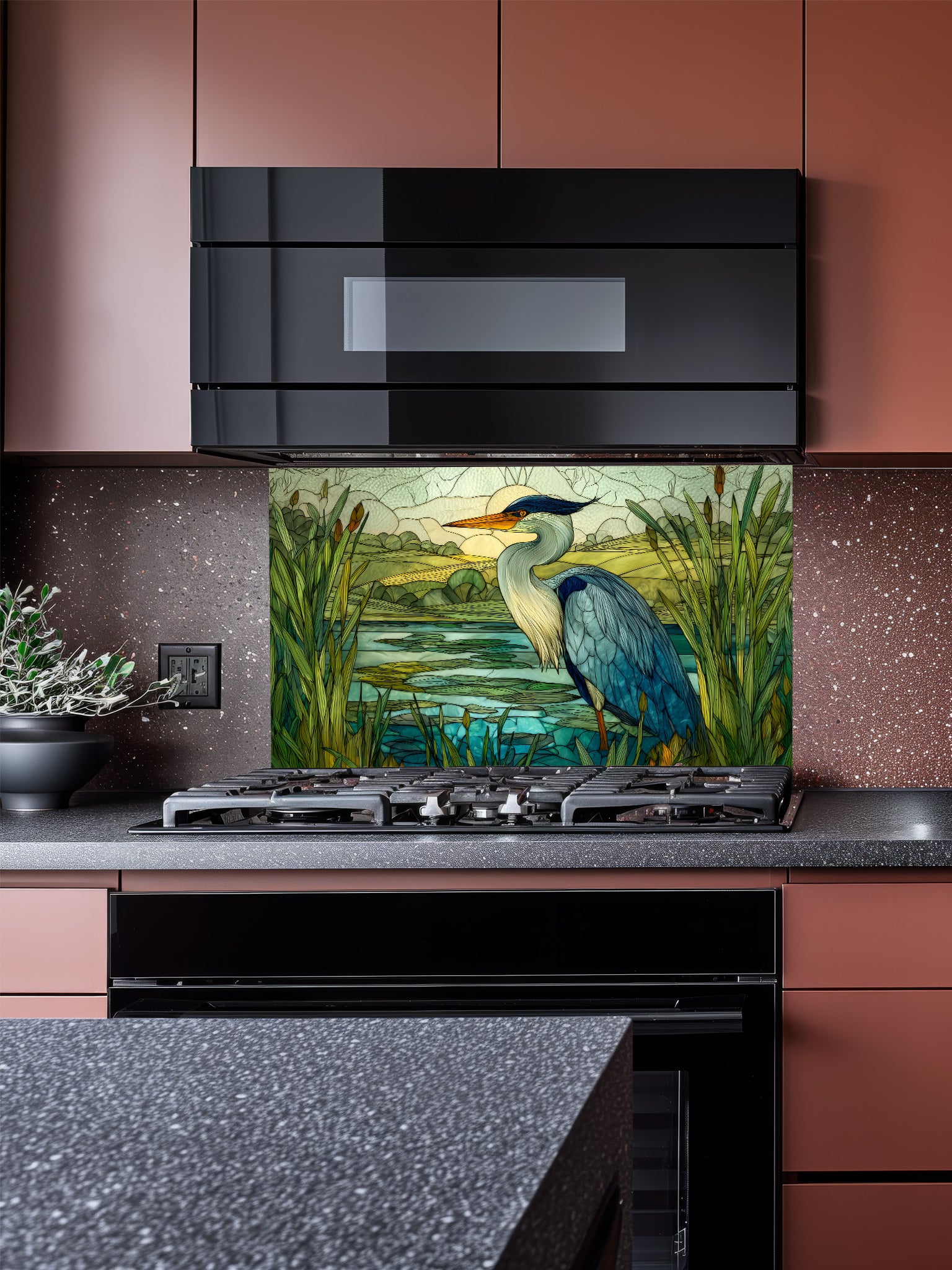 Tempered glass kitchen backsplash featuring a highly realistic 3D illusion of stained glass art showing a majestic blue heron standing in a serene wetland marsh with green cattails and a tranquil lake, installed behind a modern stainless steel stove.