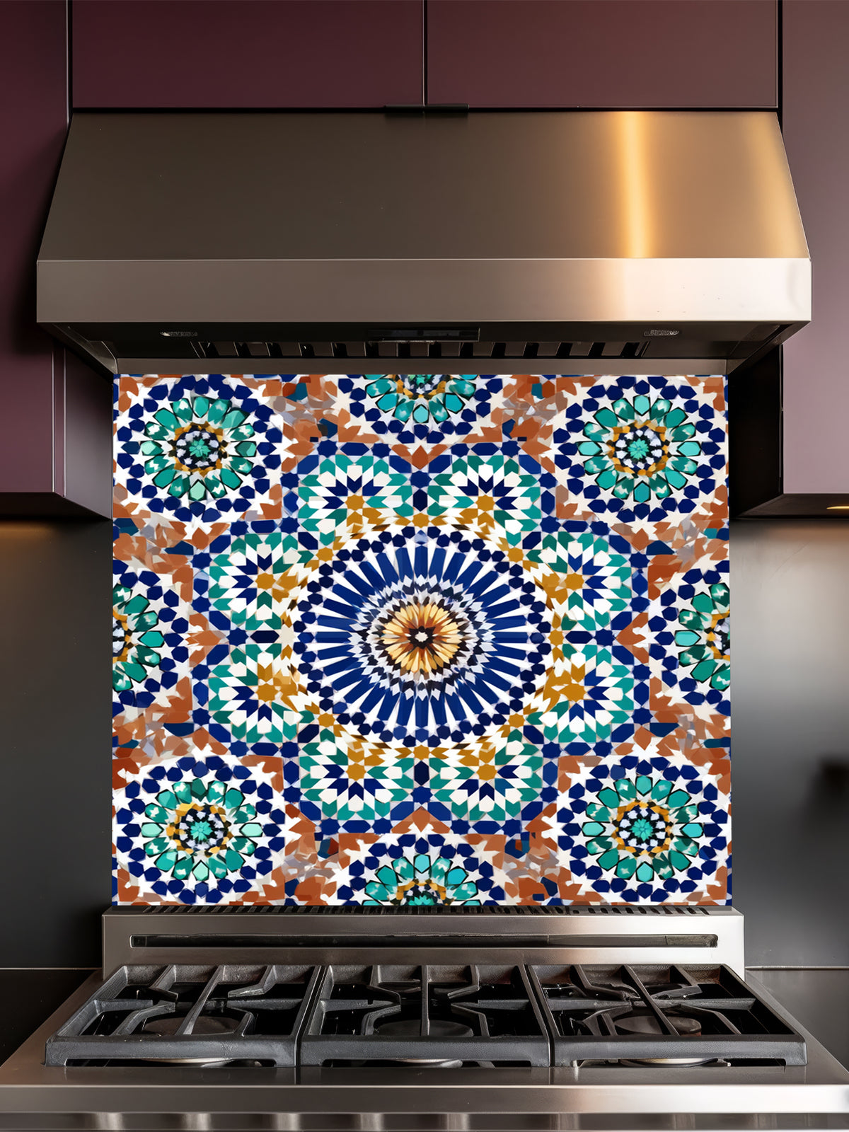 Stainless steel stove with a decorative backsplash featuring a colorful geometric pattern.