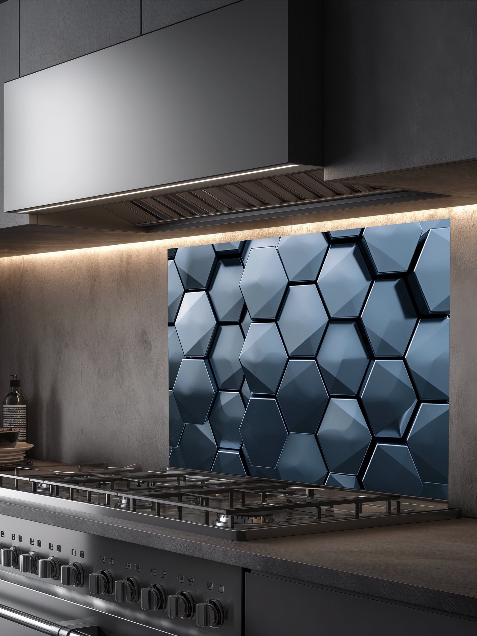 Tempered glass kitchen backsplash featuring a highly realistic 3D illusion of dark slate blue and charcoal metallic hexagon tiles in a sleek honeycomb pattern with dramatic shadow effects, installed behind a modern stainless steel stove.