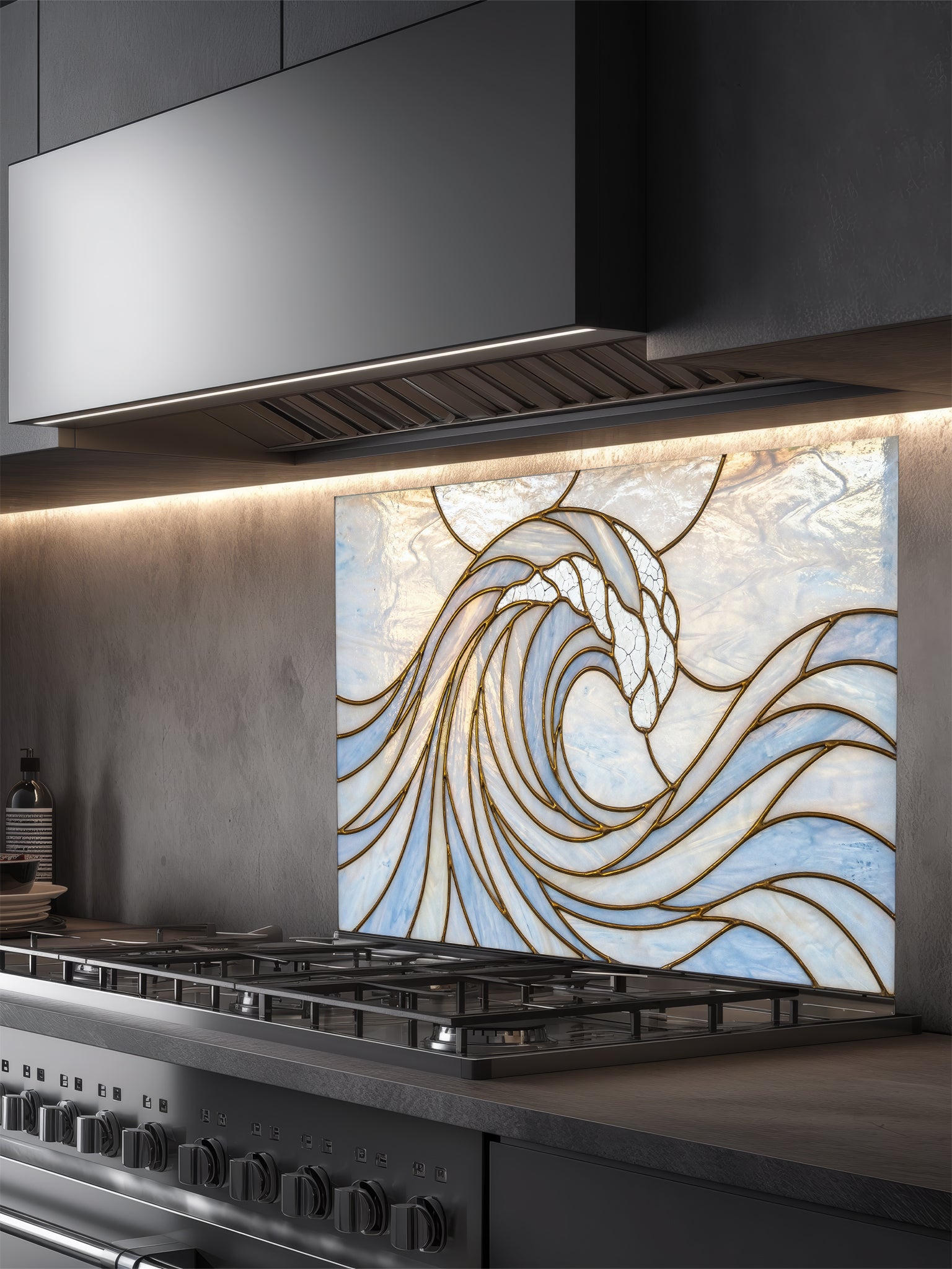 Decorative glass splashback with wave design above a kitchen stove.