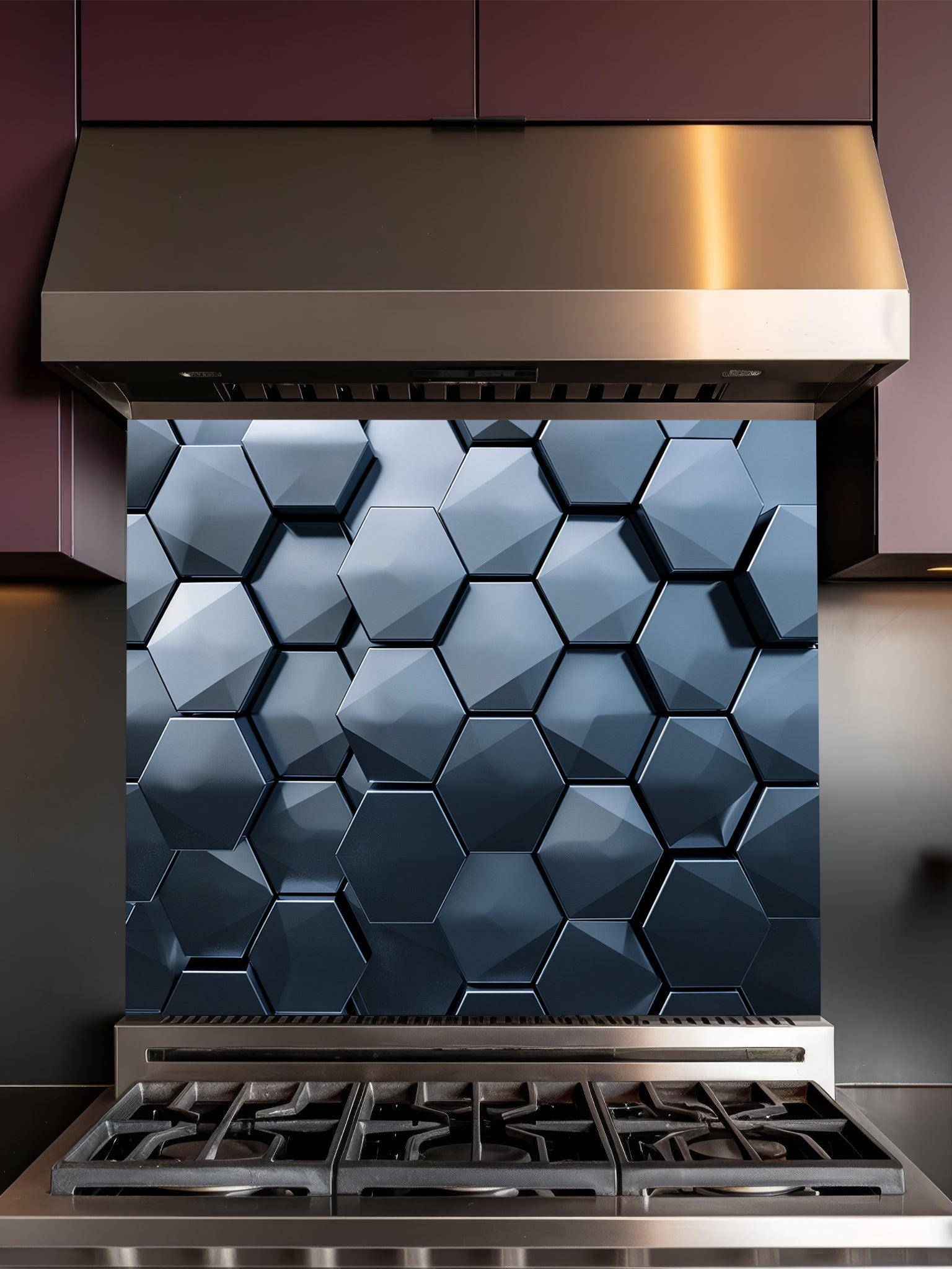 Tempered glass kitchen backsplash featuring a highly realistic 3D illusion of dark slate blue and charcoal metallic hexagon tiles in a sleek honeycomb pattern with dramatic shadow effects, installed behind a modern stainless steel stove.