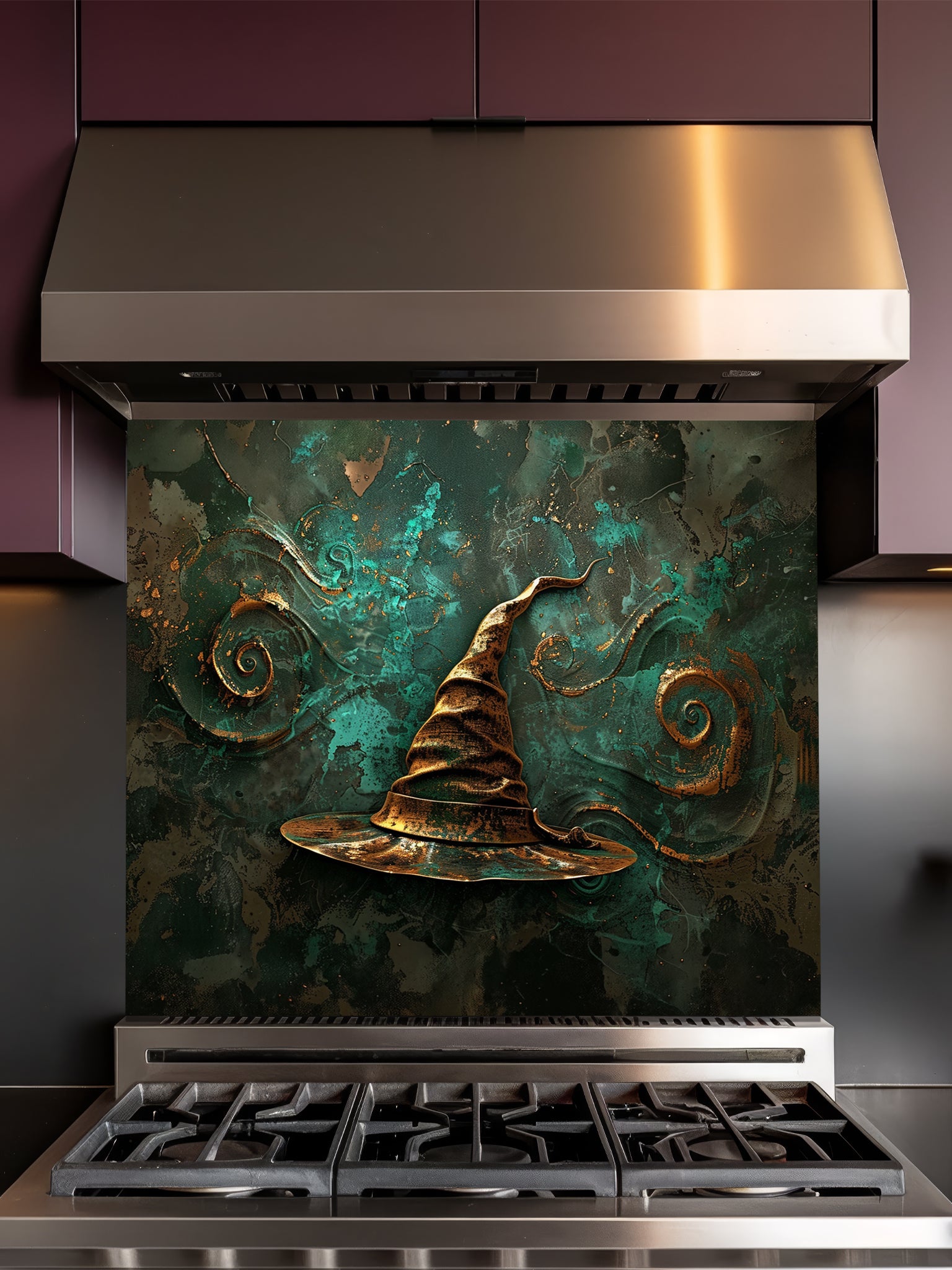 Tempered glass kitchen backsplash featuring a highly realistic 3D illusion of an antique gold sculpted witch or wizard hat surrounded by magical swirling patterns against a textured deep teal background, installed behind a modern black stove.