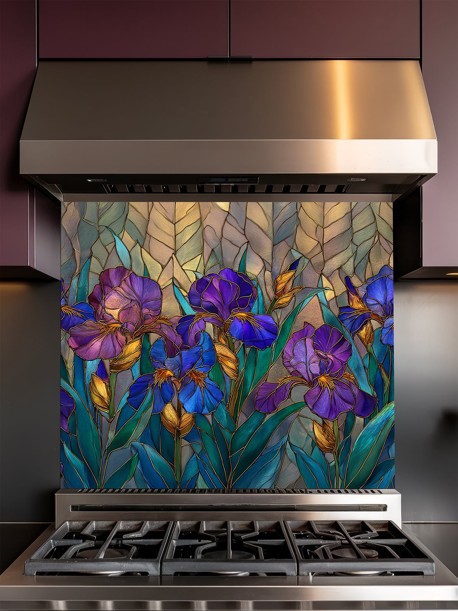 Tempered glass kitchen backsplash featuring an elegant faux stained glass design of vibrant purple and blue Iris flowers with green leaves and elegant gold outlines, installed behind a modern stainless steel stove.