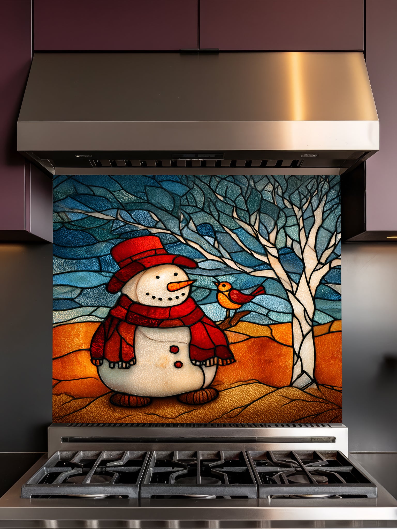 Tempered glass kitchen backsplash featuring a highly realistic 3D illusion of stained glass art showing a cheerful snowman in a red hat and a cute little bird perched on a winter tree against a frosty blue and amber background, installed behind a modern black stove.