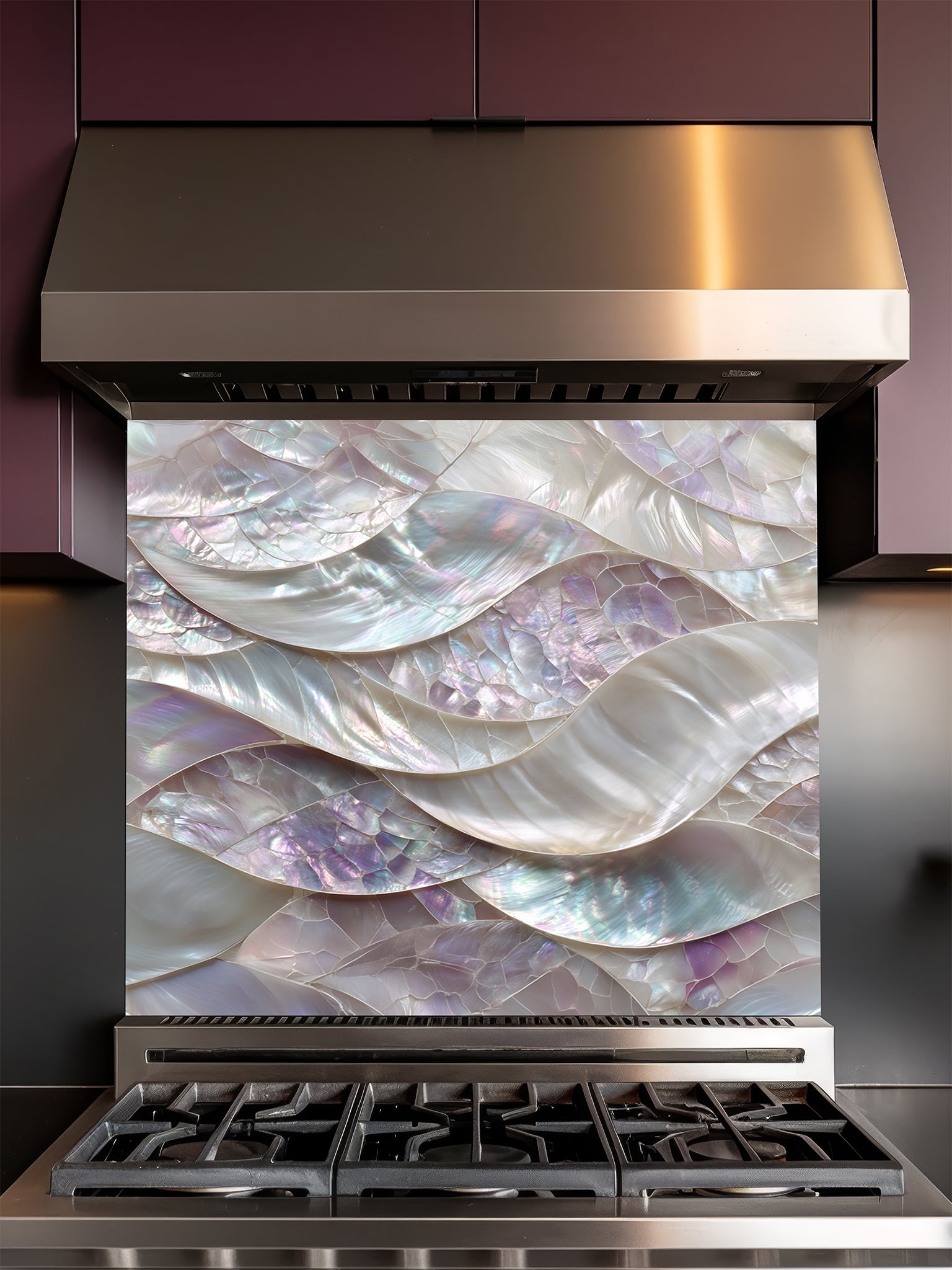 Tempered glass kitchen backsplash featuring a highly realistic 3D faux mosaic design of continuous flowing waves of mother of pearl shells with iridescent pastel colors, installed behind a modern stainless steel stove.