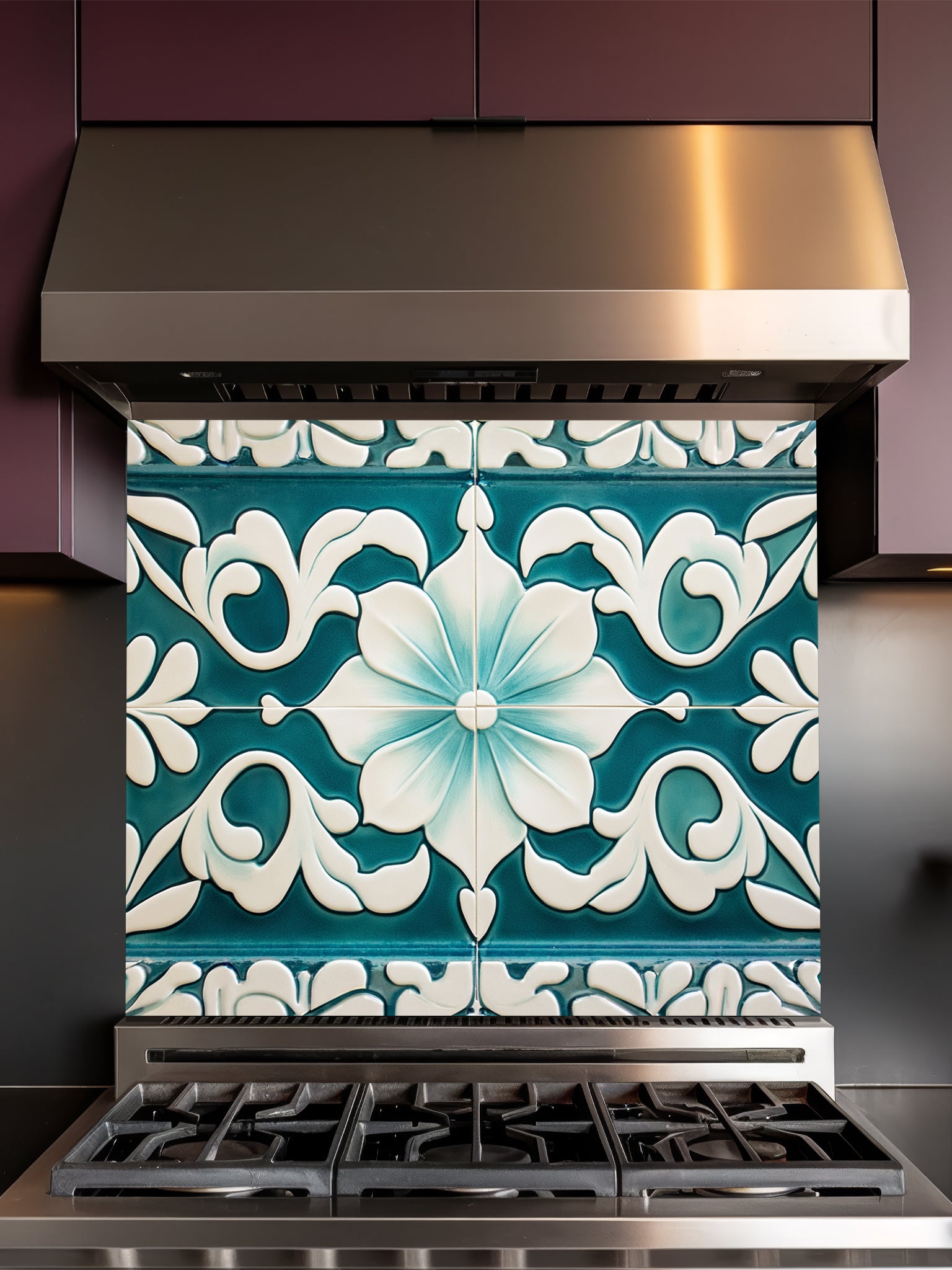 Tempered glass kitchen backsplash featuring a highly realistic illusion of traditional Mediterranean or Talavera tiles, showcasing a large, elegant floral or lotus pattern in deep teal and creamy ivory, installed behind a modern black stove.