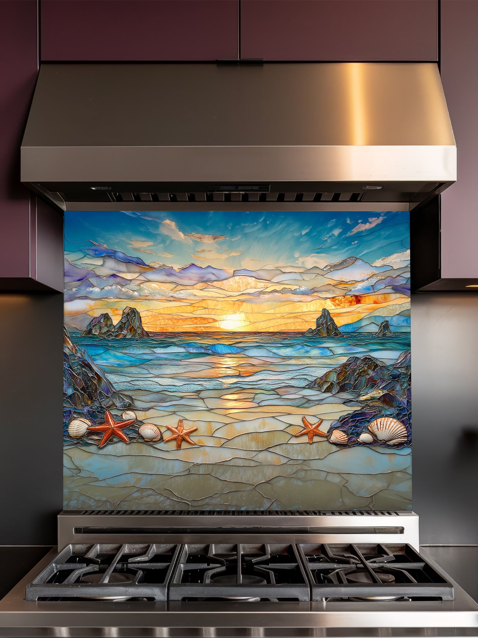 Stained glass style beach sunset with ocean waves, rocky cliffs, seashells, and starfish, UV printed on a smooth tempered glass kitchen backsplash, installed behind a modern stove.
