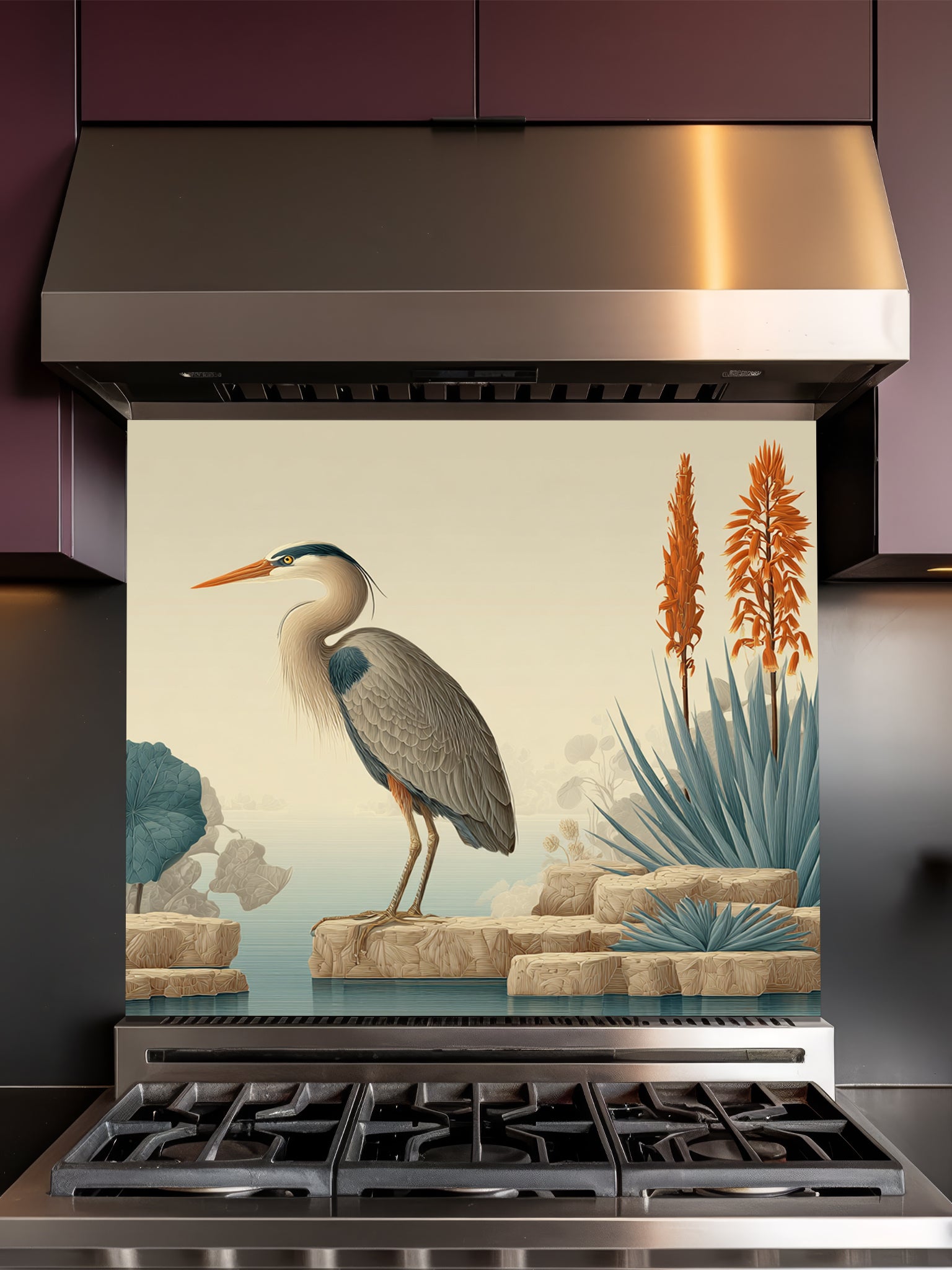 Tempered glass kitchen backsplash featuring a highly realistic illusion of a vintage naturalist illustration showing a serene blue heron standing on beige rocks among muted teal lotus leaves and tall orange exotic flowers against a soft cream background, installed behind a modern black stove.