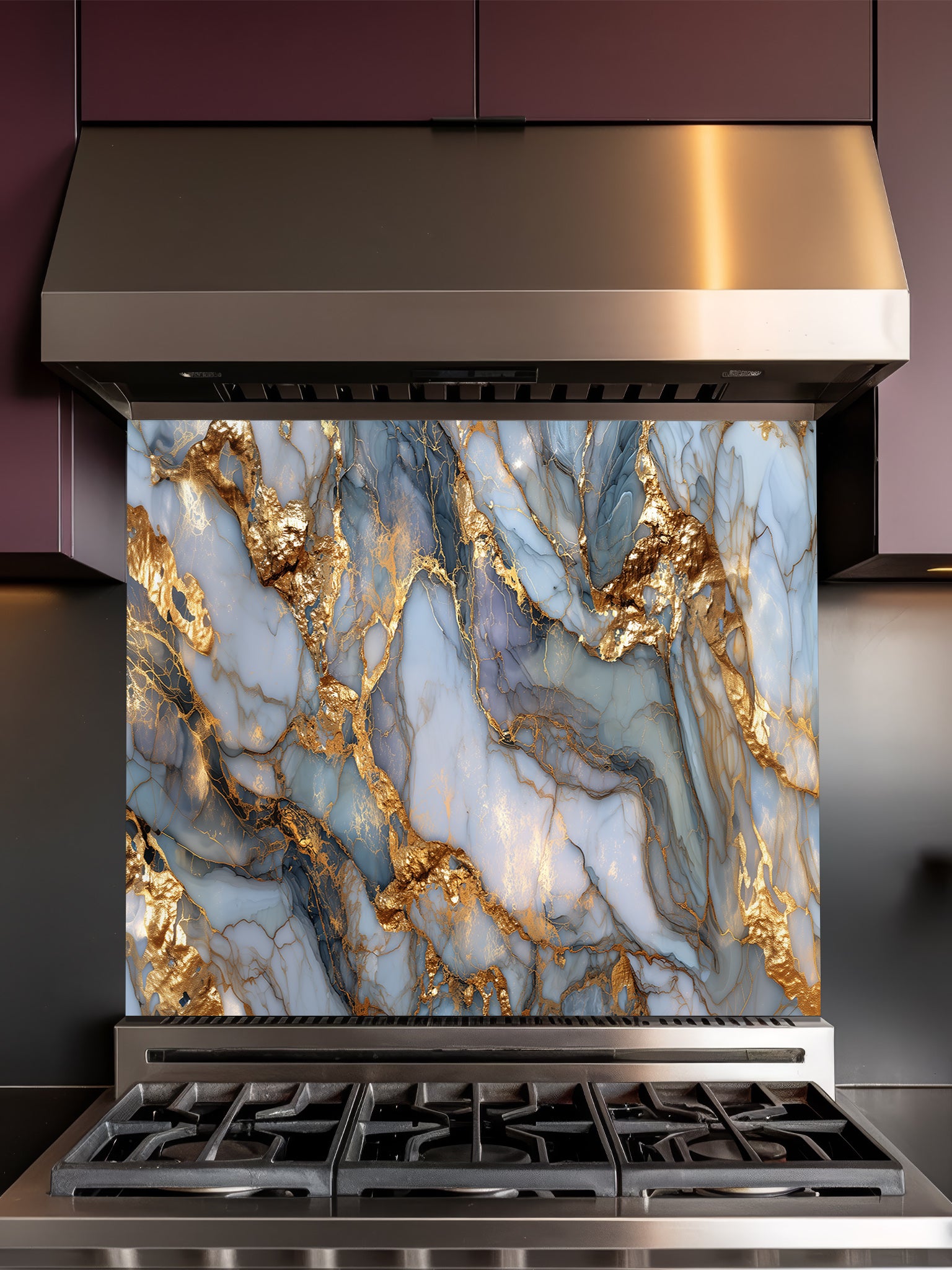 Stainless steel stove with a decorative marble splashback panel.