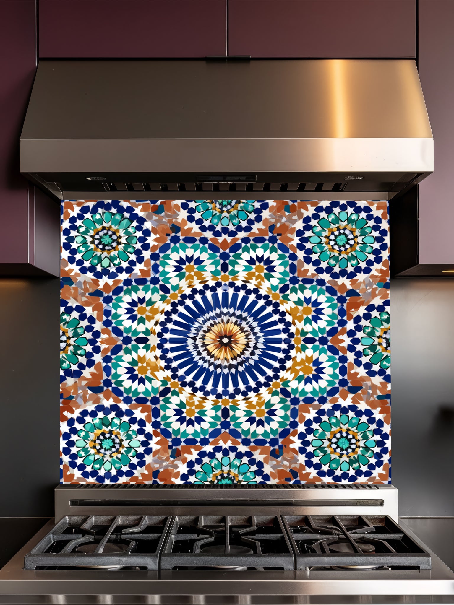 Stainless steel stove with a decorative backsplash featuring a colorful geometric pattern.
