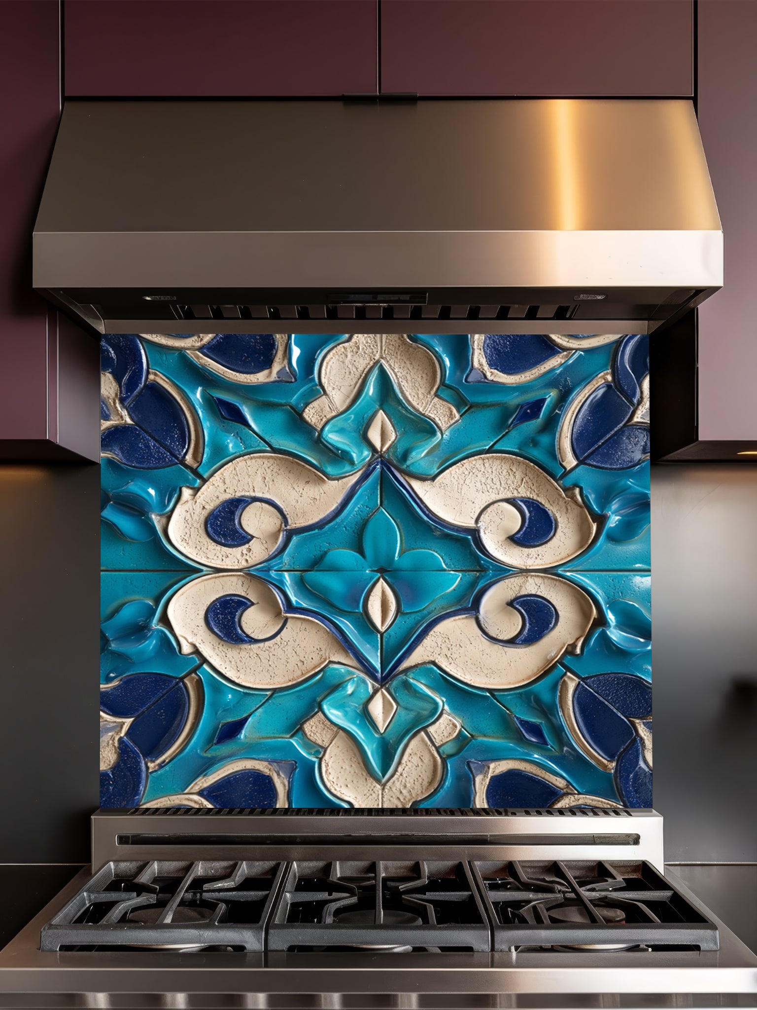 A stylish kitchen featuring a sleek tempered glass backsplash with a highly realistic 3D embossed Moroccan arabesque pattern in teal, navy blue, and beige, installed behind a black stove.
