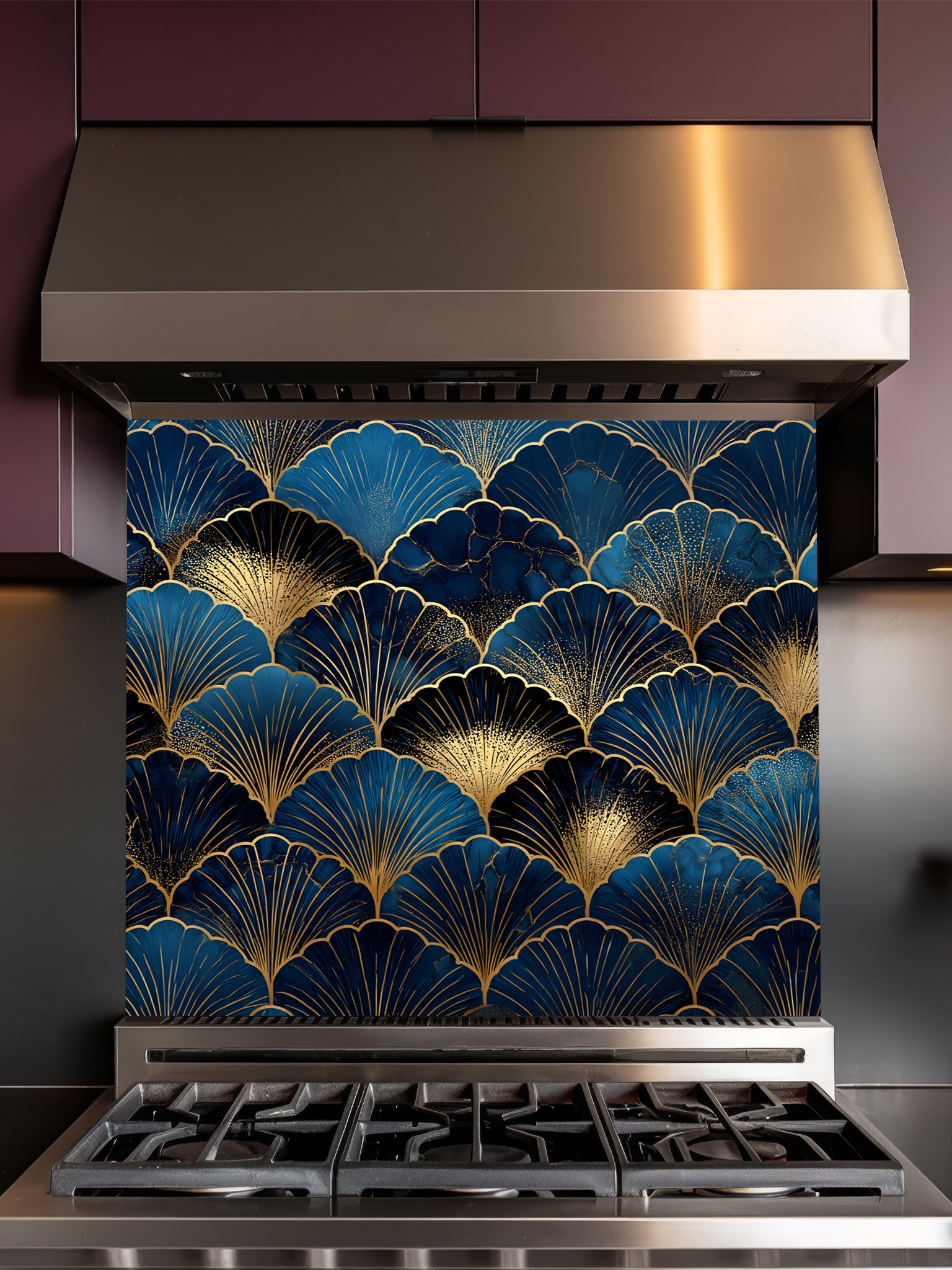 Elegant Art Deco geometric scalloped fan pattern in deep navy blue and gold, UV printed on a smooth tempered glass kitchen backsplash, installed behind a modern stove.