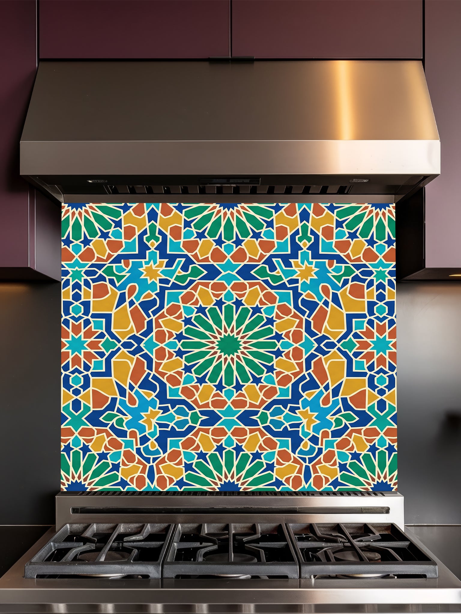 Stainless steel oven with a colorful geometric patterned backsplash