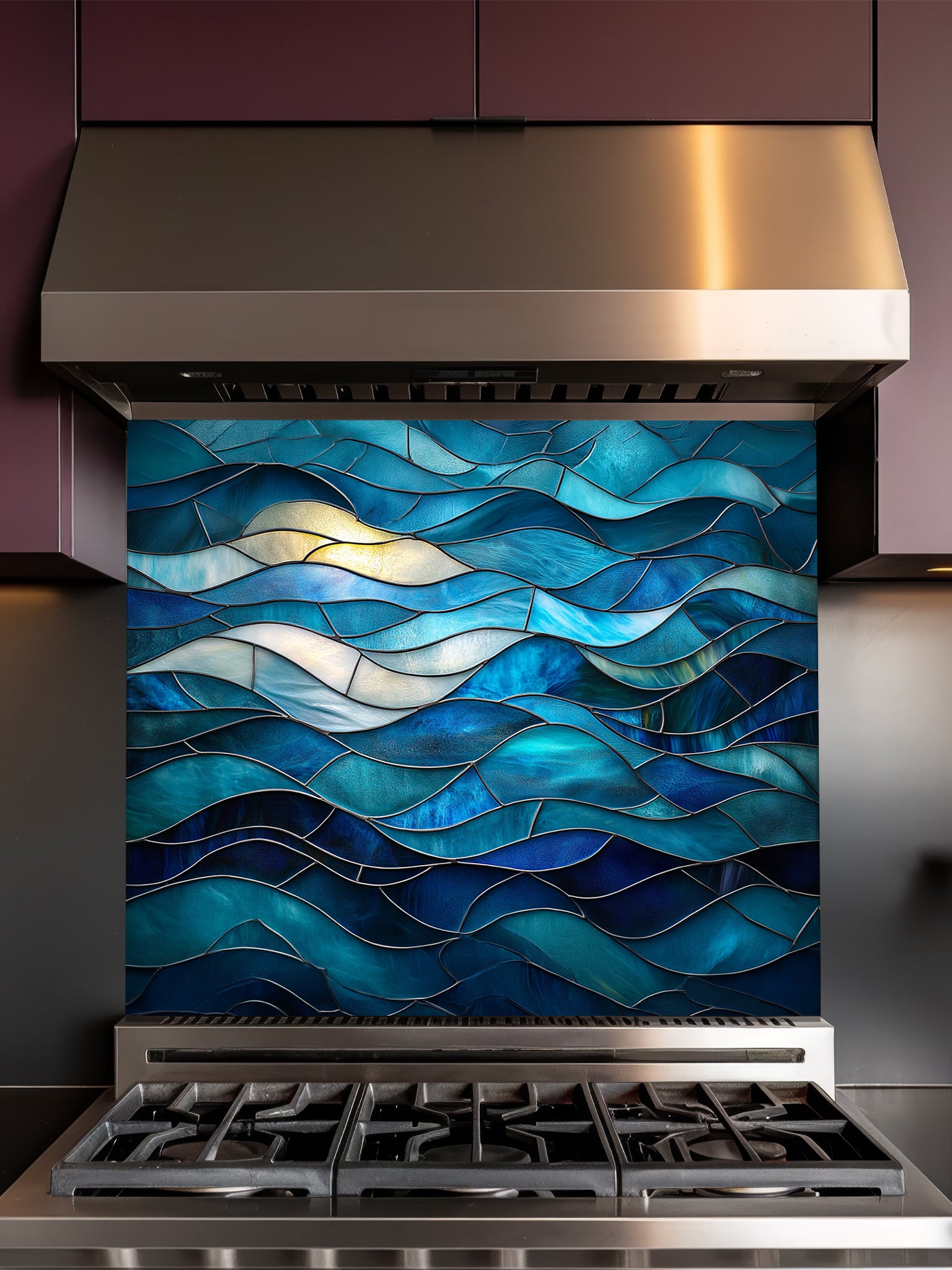 Stained glass style abstract ocean waves in rich blue and turquoise hues, UV printed on a smooth tempered glass kitchen backsplash, installed behind a modern stove.