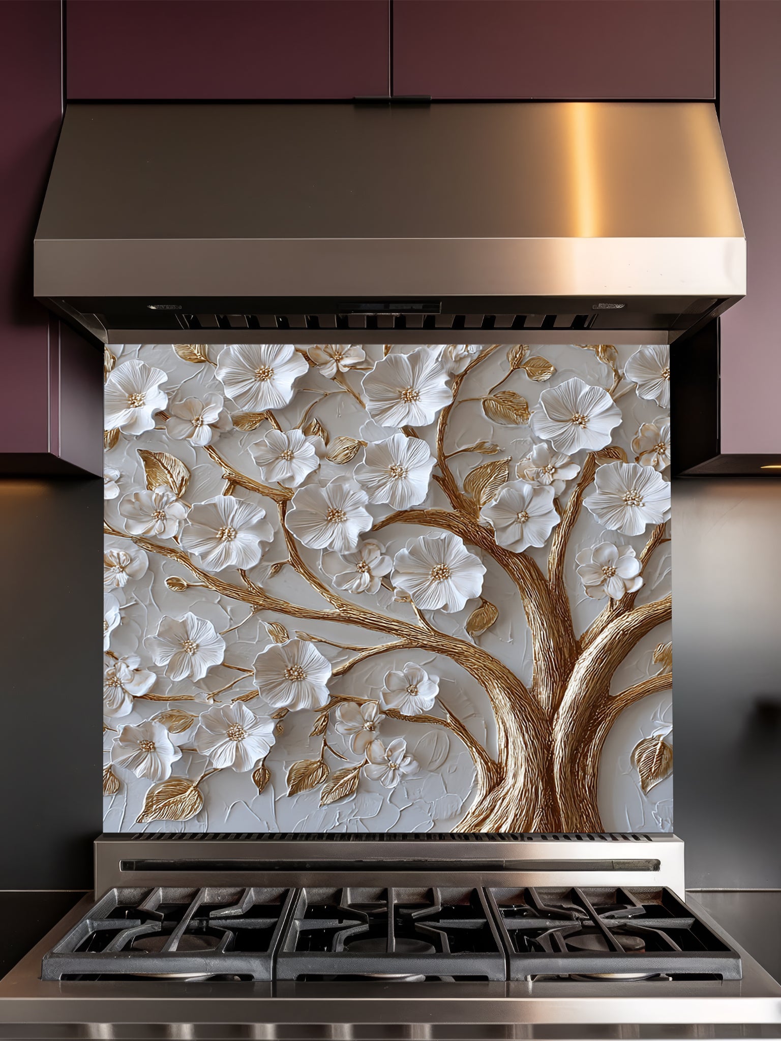 Faux 3D sculpted relief of a floral tree with pearl-white blossoms and heavy molten gold branches on a textured champagne background, UV printed on a smooth tempered glass kitchen backsplash.
