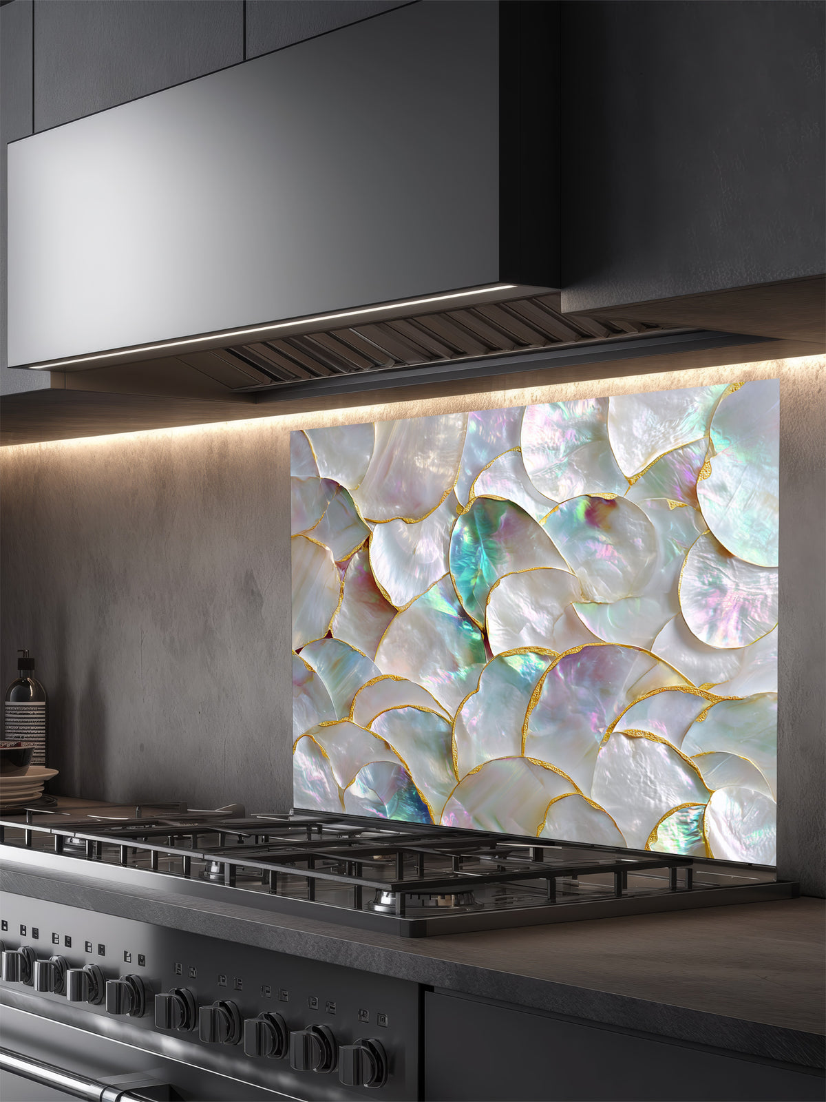 Tempered glass kitchen backsplash featuring a highly realistic 3D illusion of a luxury mother of pearl shell mosaic with iridescent pearlescent hues and faux gold edges, installed behind a modern stainless steel stove.