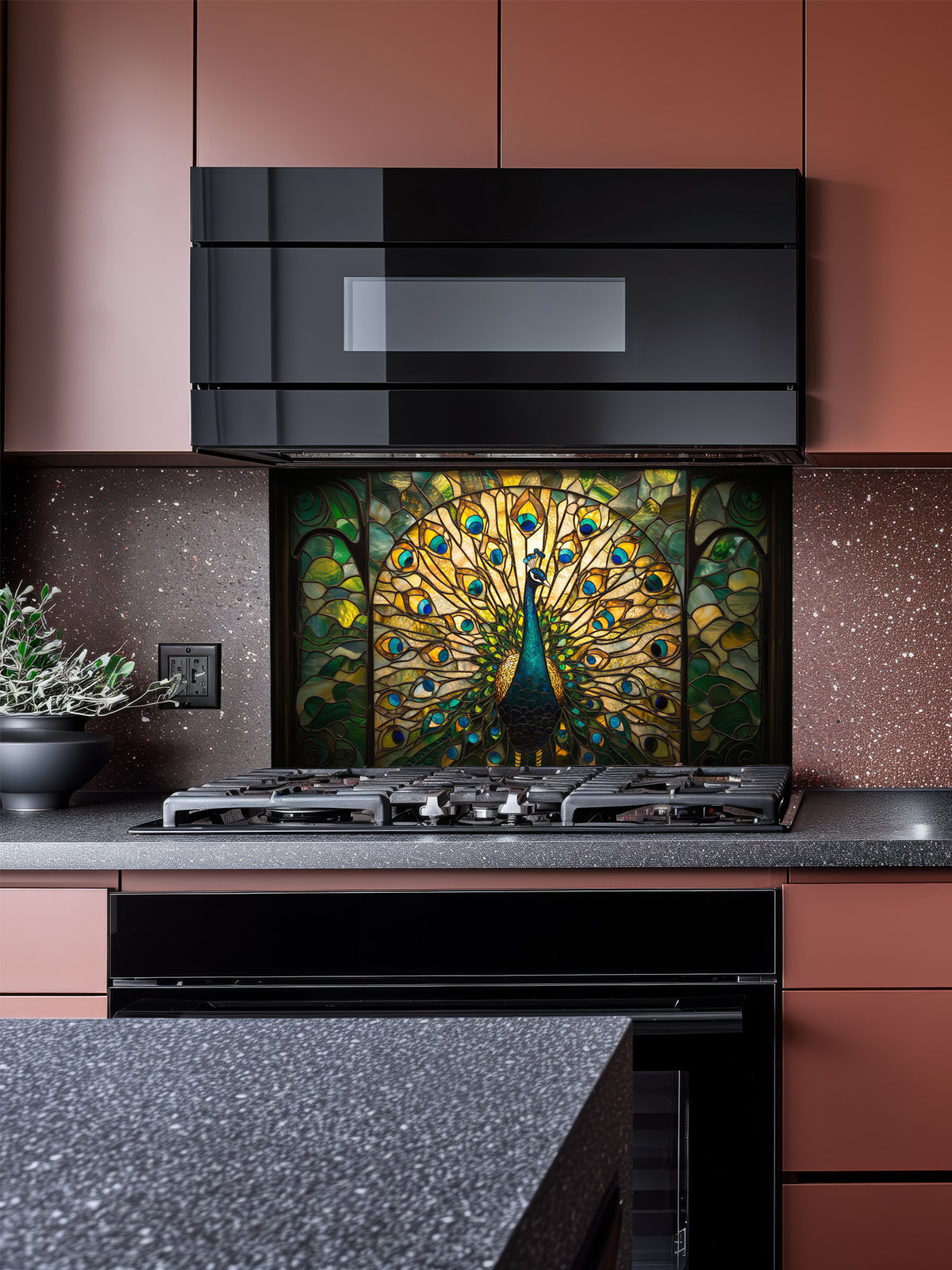 Tempered glass kitchen backsplash featuring a highly realistic 3D illusion of stained glass art showing a majestic peacock with fully spread tail feathers in vibrant emerald greens, blues, and gold, installed behind a modern stainless steel stove.