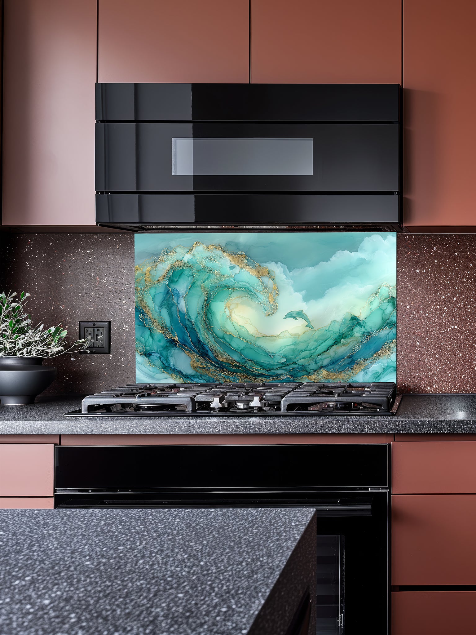 Tempered glass kitchen backsplash featuring a vibrant teal and gold abstract alcohol ink ocean wave with a small jumping dolphin, installed behind a modern stainless steel stove.