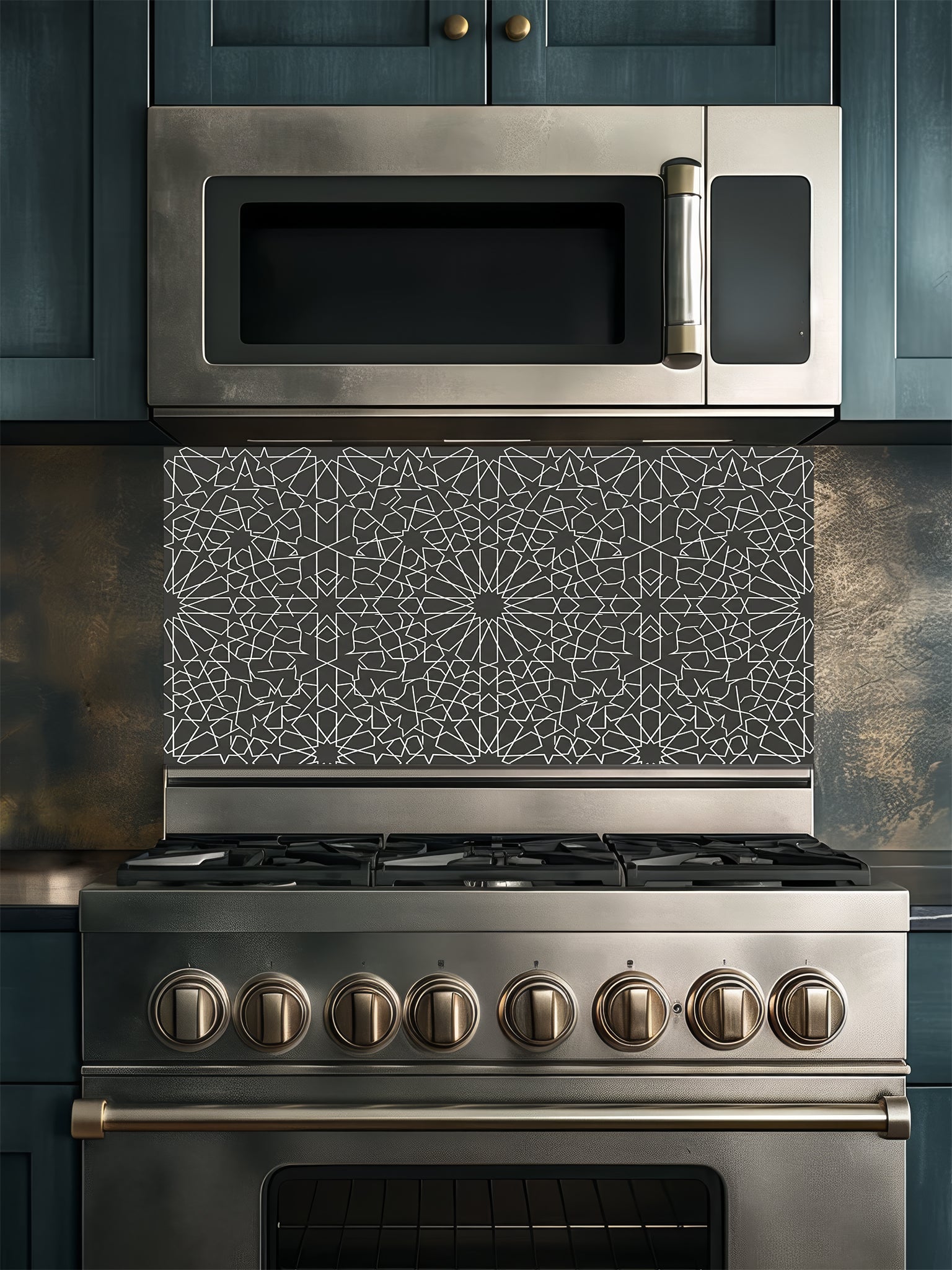 Stainless steel oven and microwave with decorative backsplash in a kitchen setting