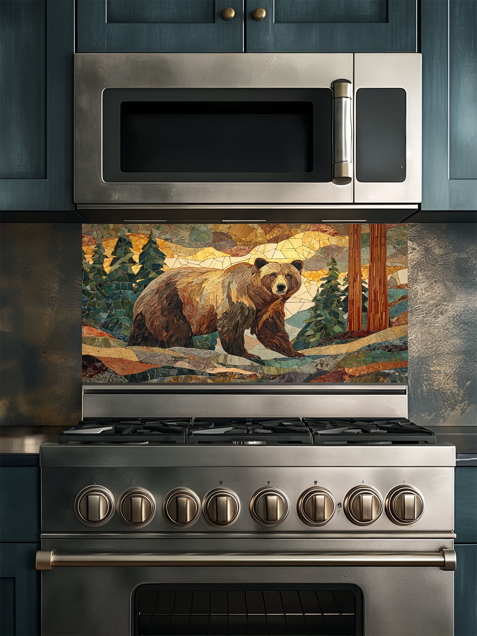 Tempered glass kitchen backsplash featuring a highly realistic 3D illusion of a rugged stone mosaic artwork showing a majestic brown bear walking through a forest of pine trees and mountains in earthy brown, green, and golden tones, installed behind a modern black stove.