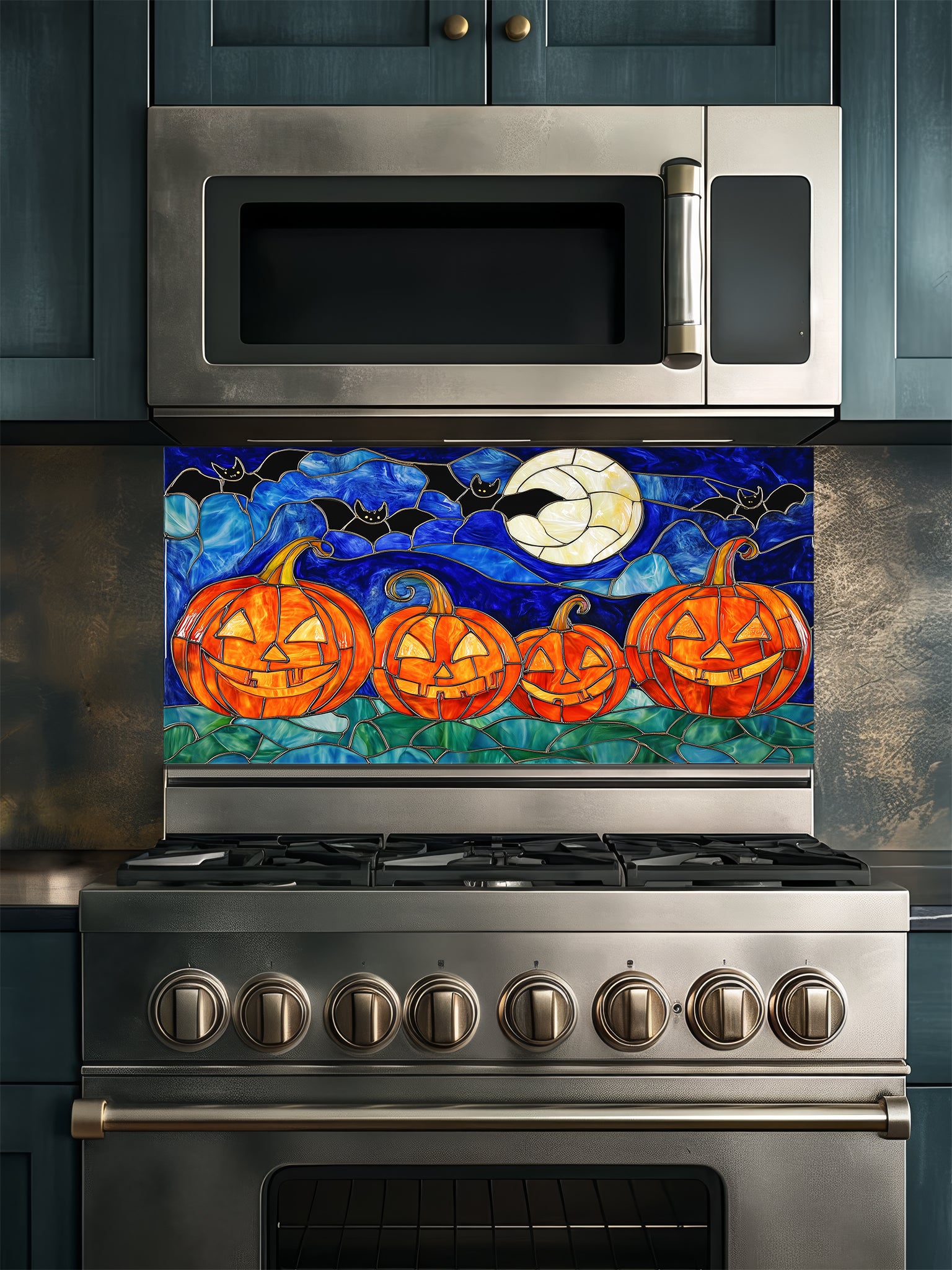Stainless steel oven with a decorative Halloween-themed backsplash