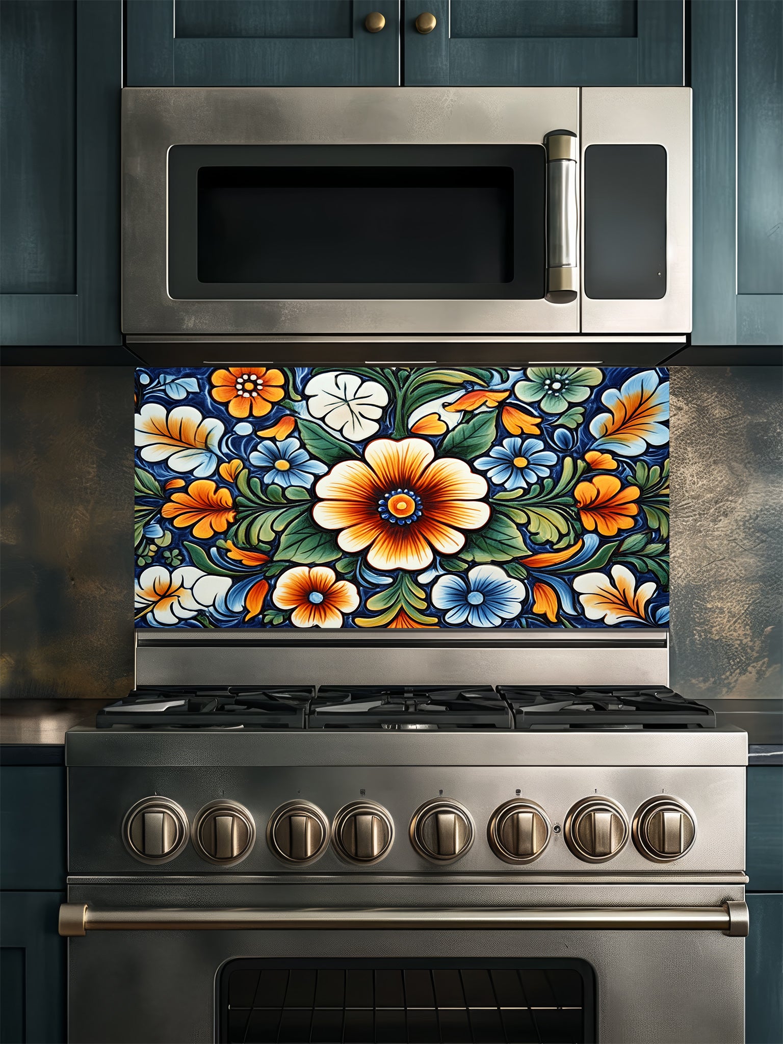 Vibrant Mexican Talavera style floral pattern in blue, orange, and green, UV printed on a smooth tempered glass kitchen backsplash, installed behind a modern stove.