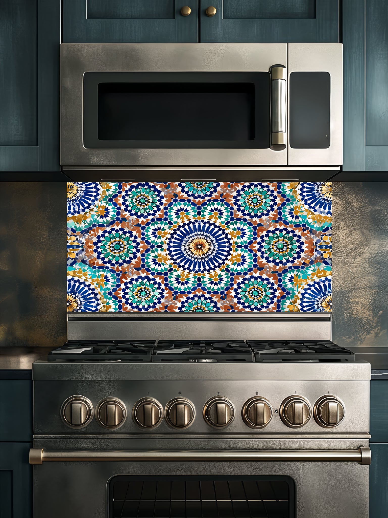 Stainless steel microwave and oven with colorful mosaic backsplash in a kitchen setting.
