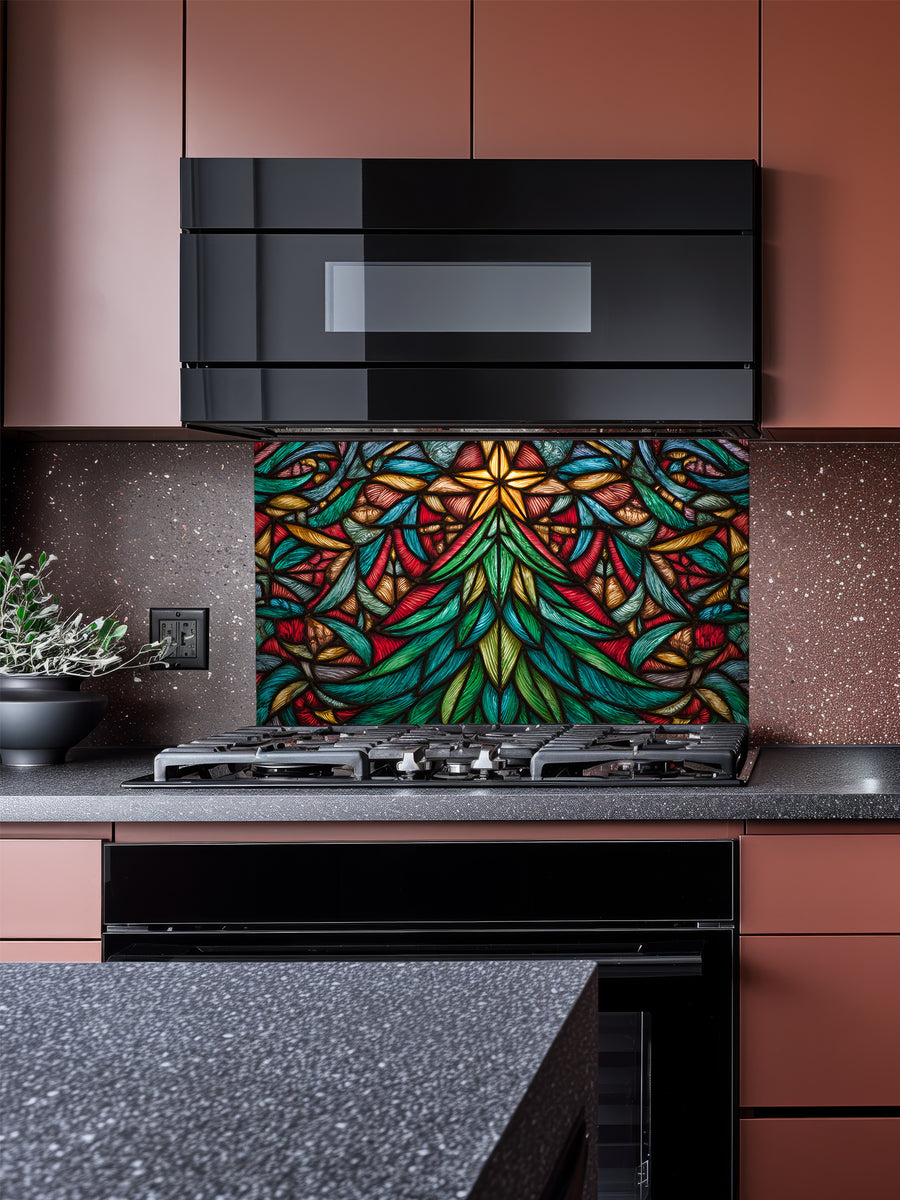 Tempered glass kitchen backsplash featuring a highly realistic 3D illusion of stained glass art showing a vibrant, symmetrical geometric Christmas tree with a glowing gold star at the top in rich jewel tones of emerald green, ruby red, and amber, installed behind a modern black stove.