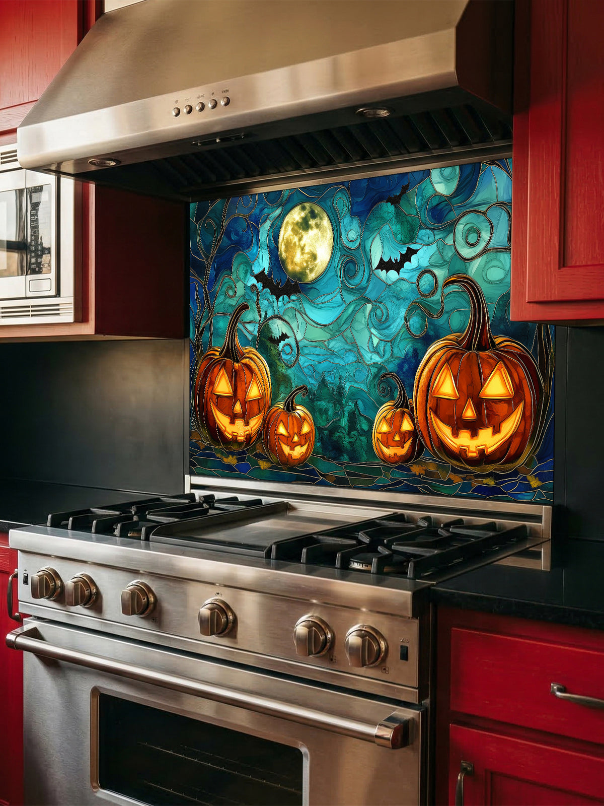 Decorative Halloween backsplash with pumpkins and a full moon above a kitchen stove.