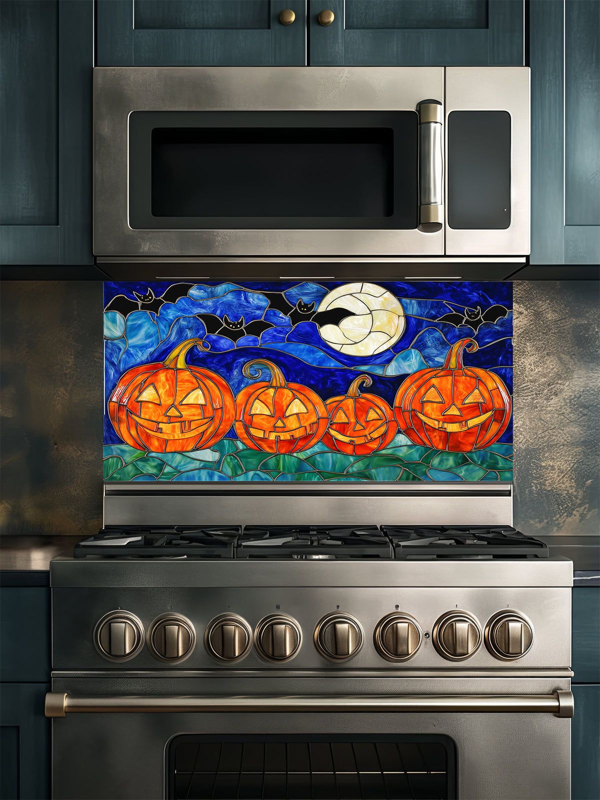 Stainless steel oven with a decorative Halloween-themed backsplash