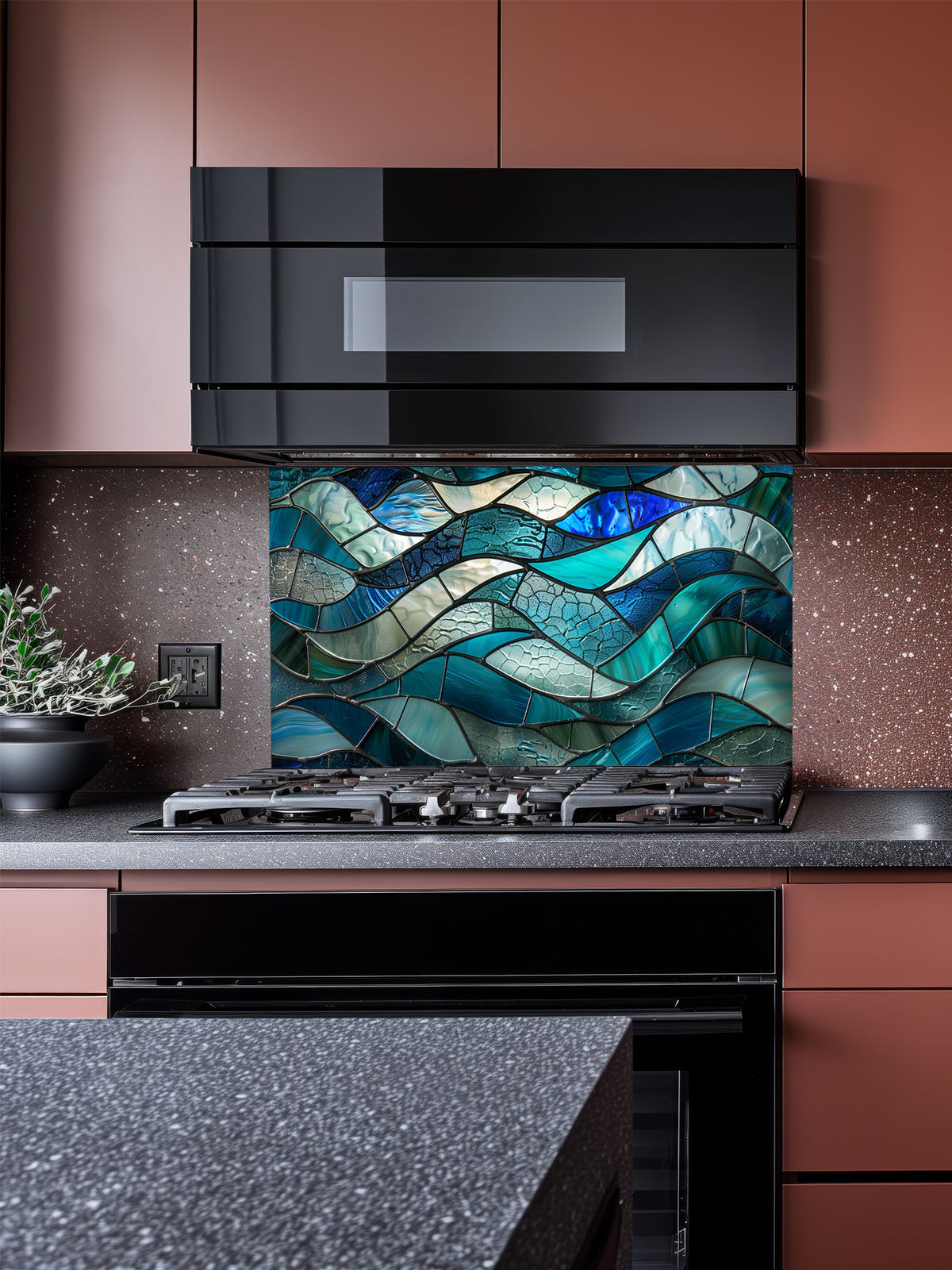 Tempered glass kitchen backsplash featuring a highly realistic 3D illusion of stained glass or sea glass art showing flowing, overlapping ocean waves in vibrant translucent shades of sapphire blue, teal, and aquamarine, installed behind a modern black stove.