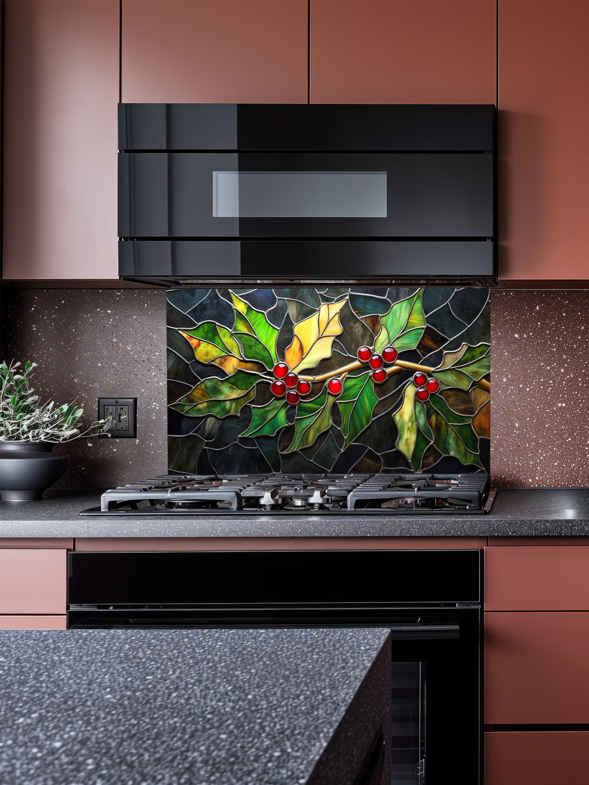 Tempered glass kitchen backsplash featuring a highly realistic 3D illusion of stained glass art showing a winter branch with vibrant green and yellow holly leaves and glowing red berries against a dark textured background, installed behind a modern black stove.