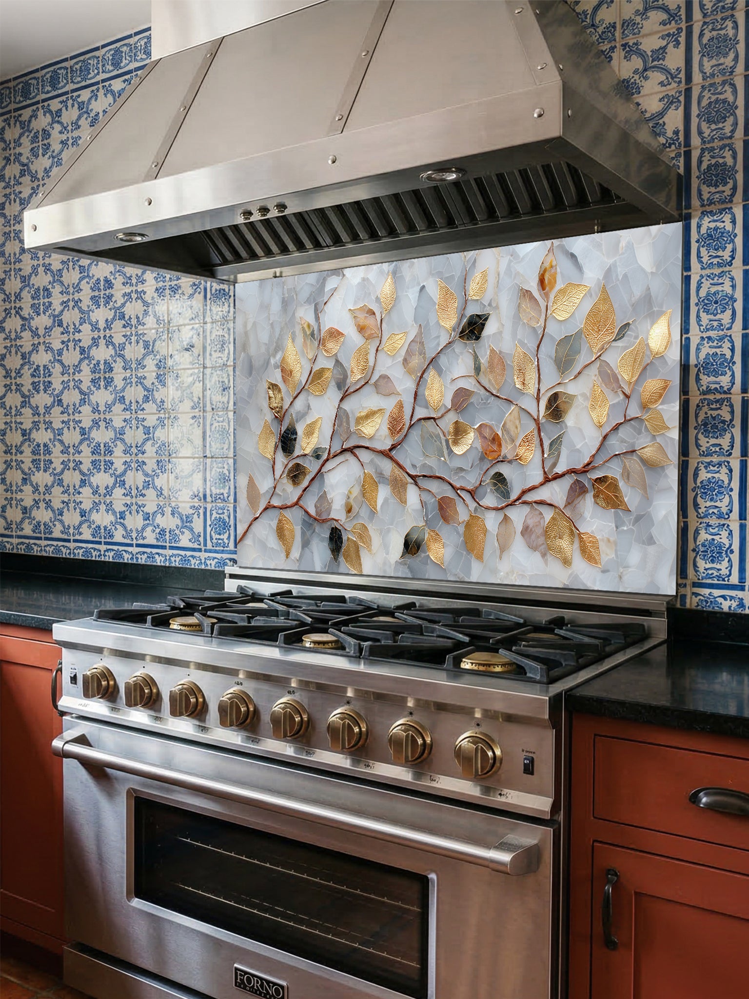 Tempered glass kitchen backsplash featuring a realistic 3D-effect design of elegant gold and bronze leaves on curving branches over a pearlescent white and soft grey cracked mosaic background, installed behind a modern stainless steel stove.
