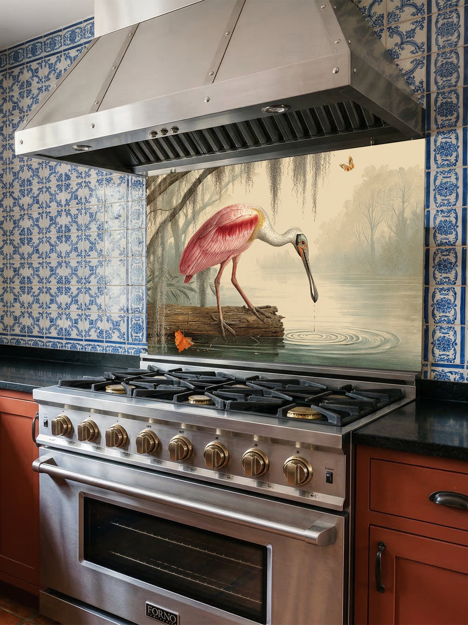 Tempered glass kitchen backsplash featuring a highly realistic illusion of a vintage Audubon-style naturalist illustration showing a beautiful pink roseate spoonbill bird wading in a swamp with weeping Spanish moss against an aged parchment background, installed behind a modern black stove.