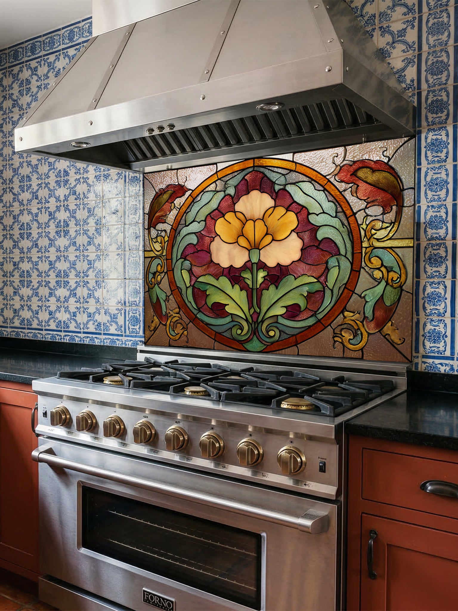 Stained glass style vintage floral medallion in warm amber, burgundy, and green tones, UV printed on a smooth tempered glass kitchen backsplash, installed behind a modern stove.
