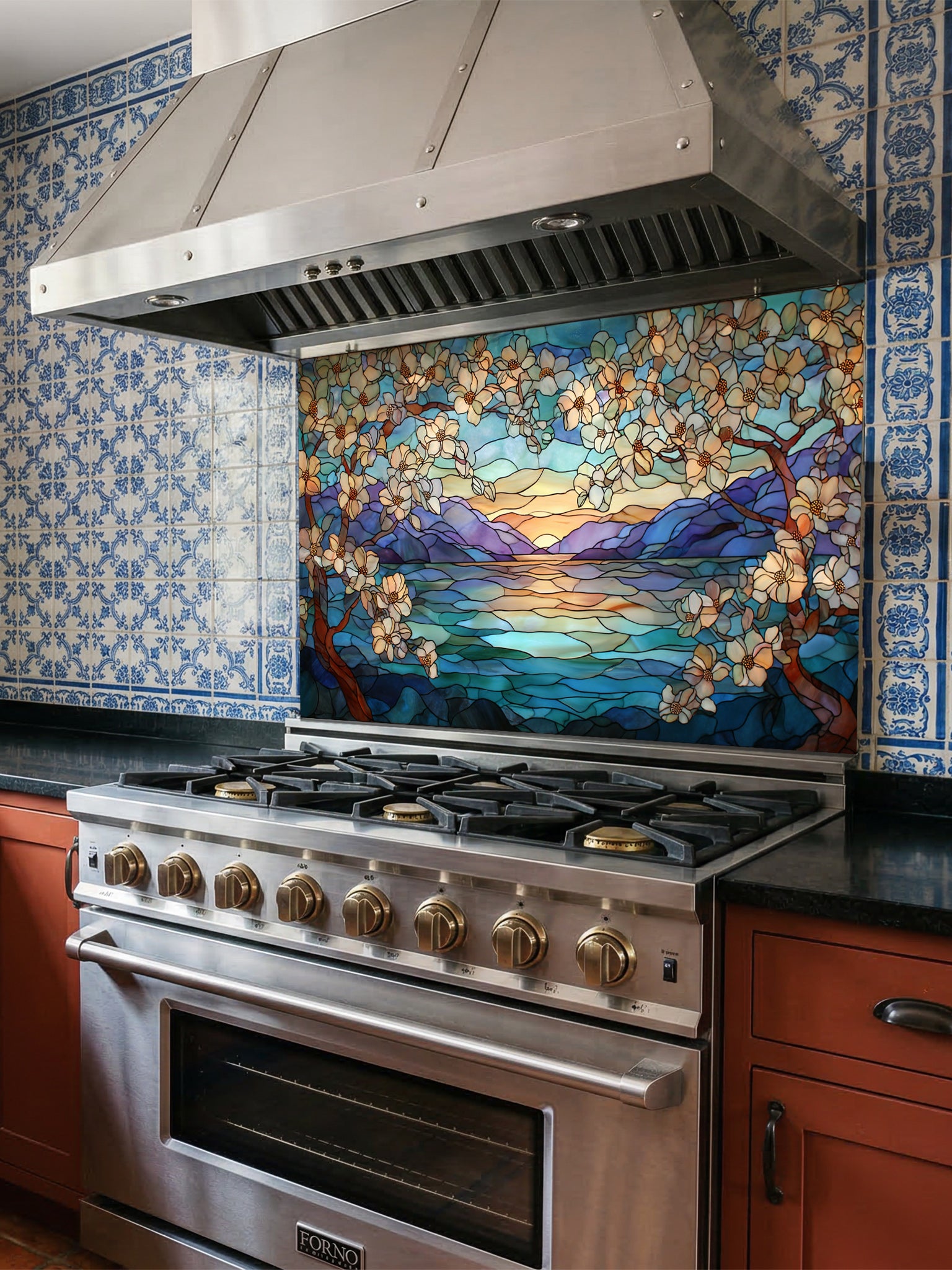 Stainless steel oven with decorative tempered glass backsplash in a kitchen setting