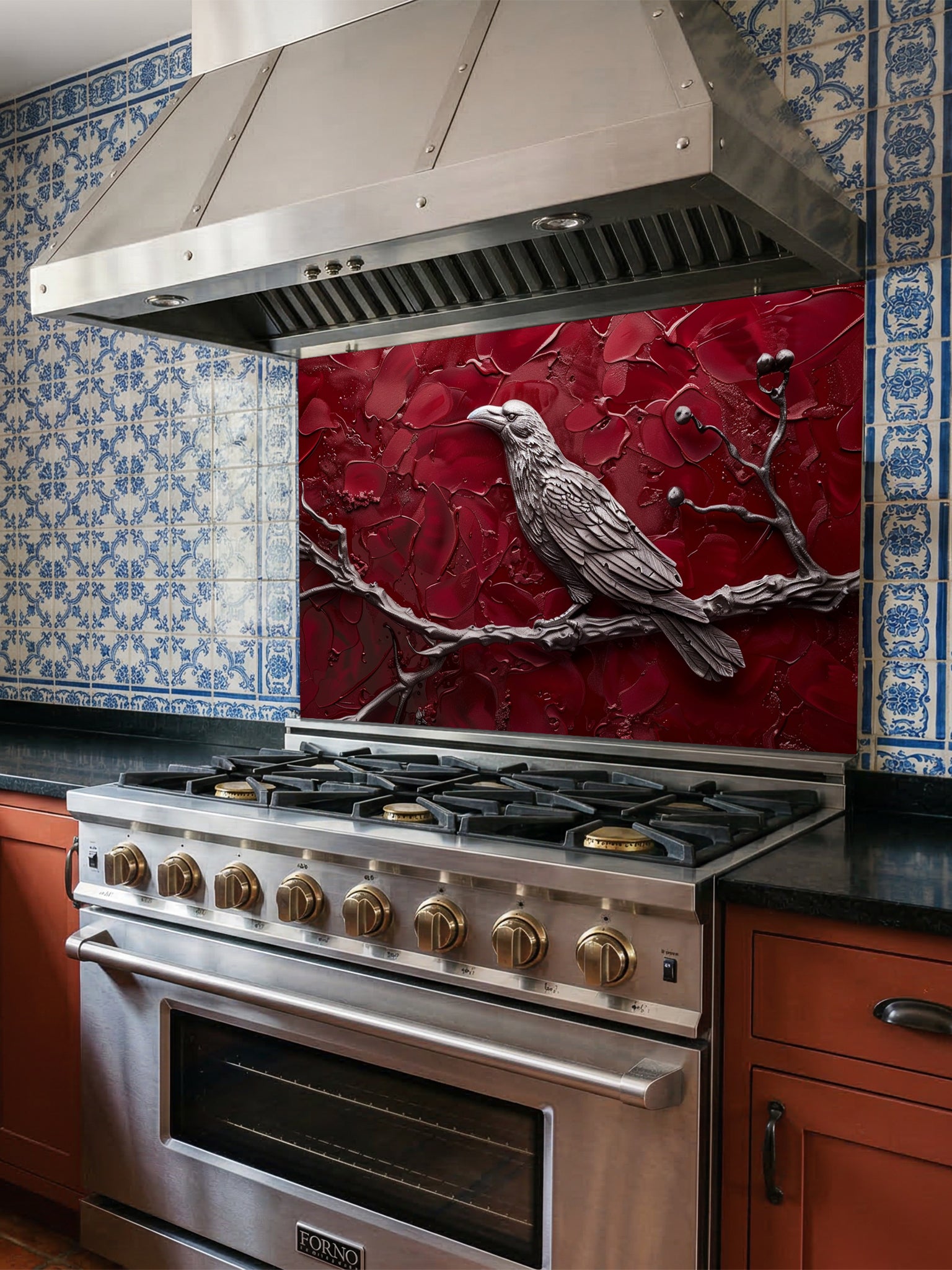 Tempered glass kitchen backsplash featuring a highly realistic 3D illusion of a sculpted metallic raven perched on a branch with berries against a heavily textured, thick impasto crimson red background, installed behind a modern black stove.