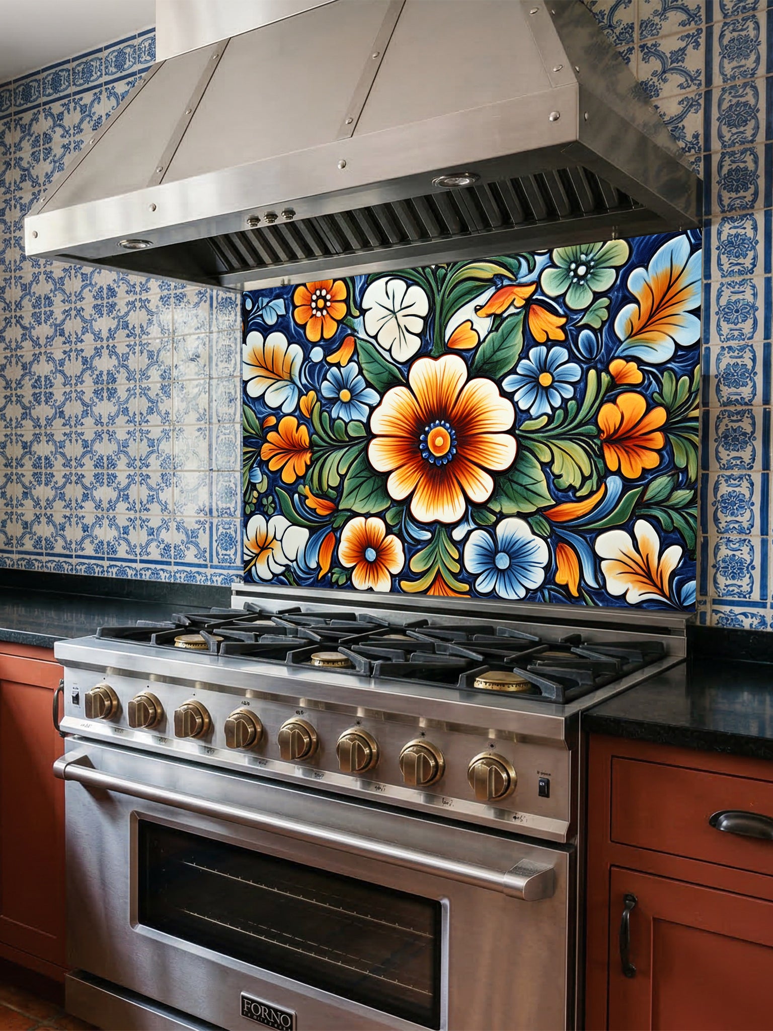 Vibrant Mexican Talavera style floral pattern in blue, orange, and green, UV printed on a smooth tempered glass kitchen backsplash, installed behind a modern stove.