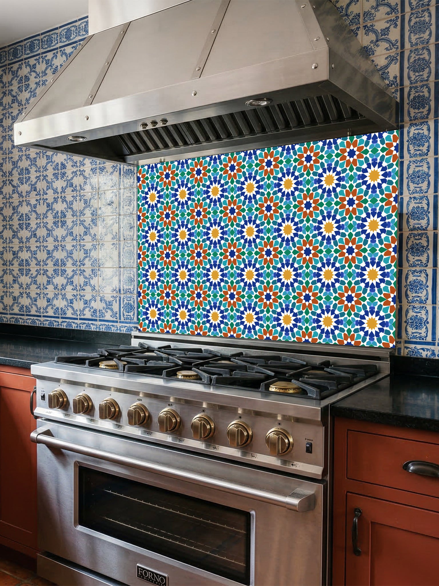 Stainless steel oven with colorful floral patterned backsplash in a kitchen.