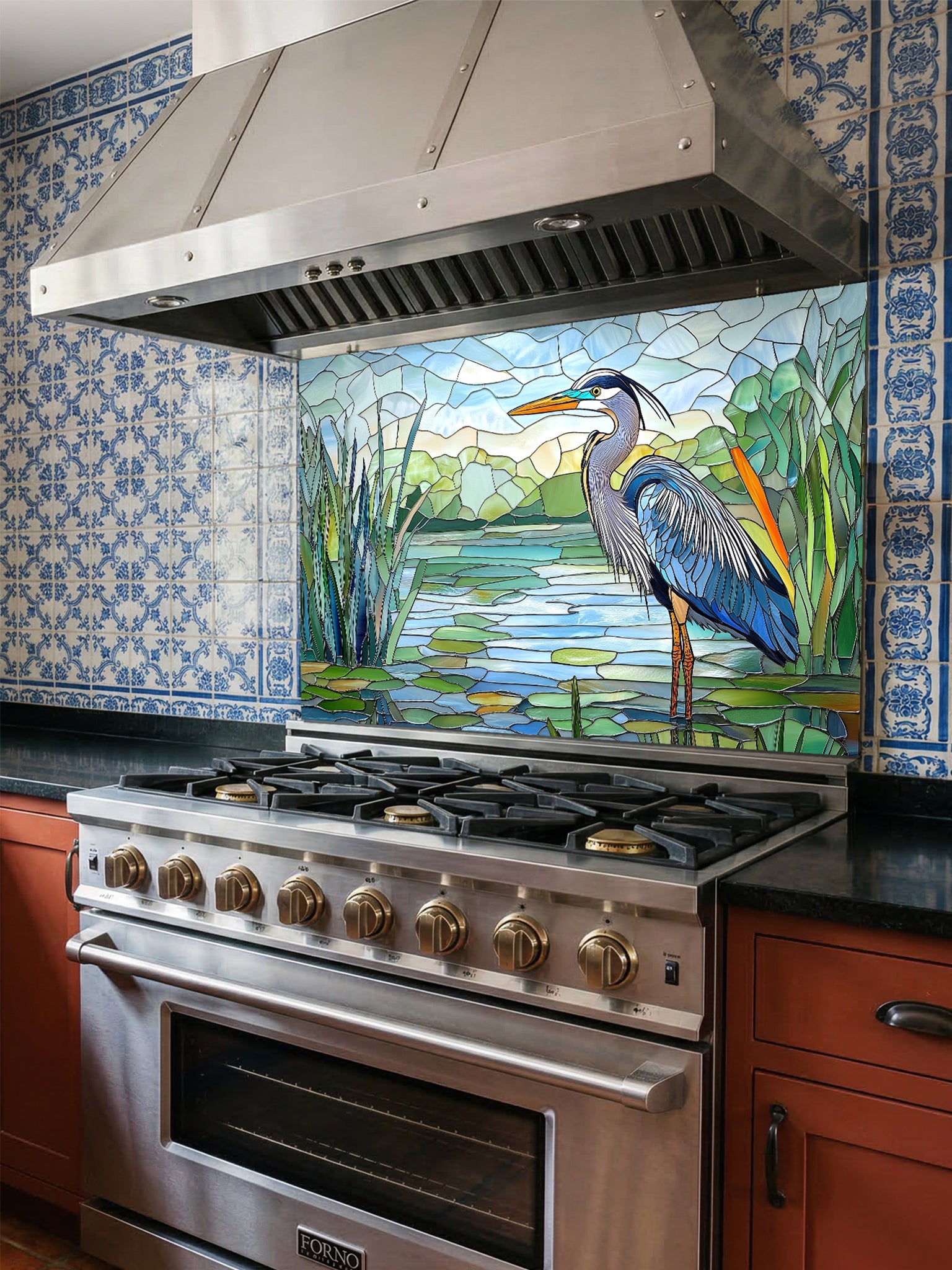 Tempered glass kitchen backsplash featuring a bright faux stained glass design of a majestic blue heron standing among lily pads against a clear blue sky and tranquil wetland, installed behind a modern stainless steel stove.