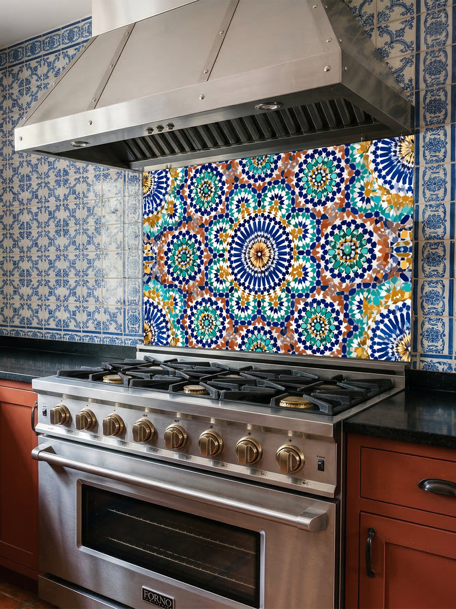 Stainless steel oven with colorful mosaic tile backsplash in a kitchen.