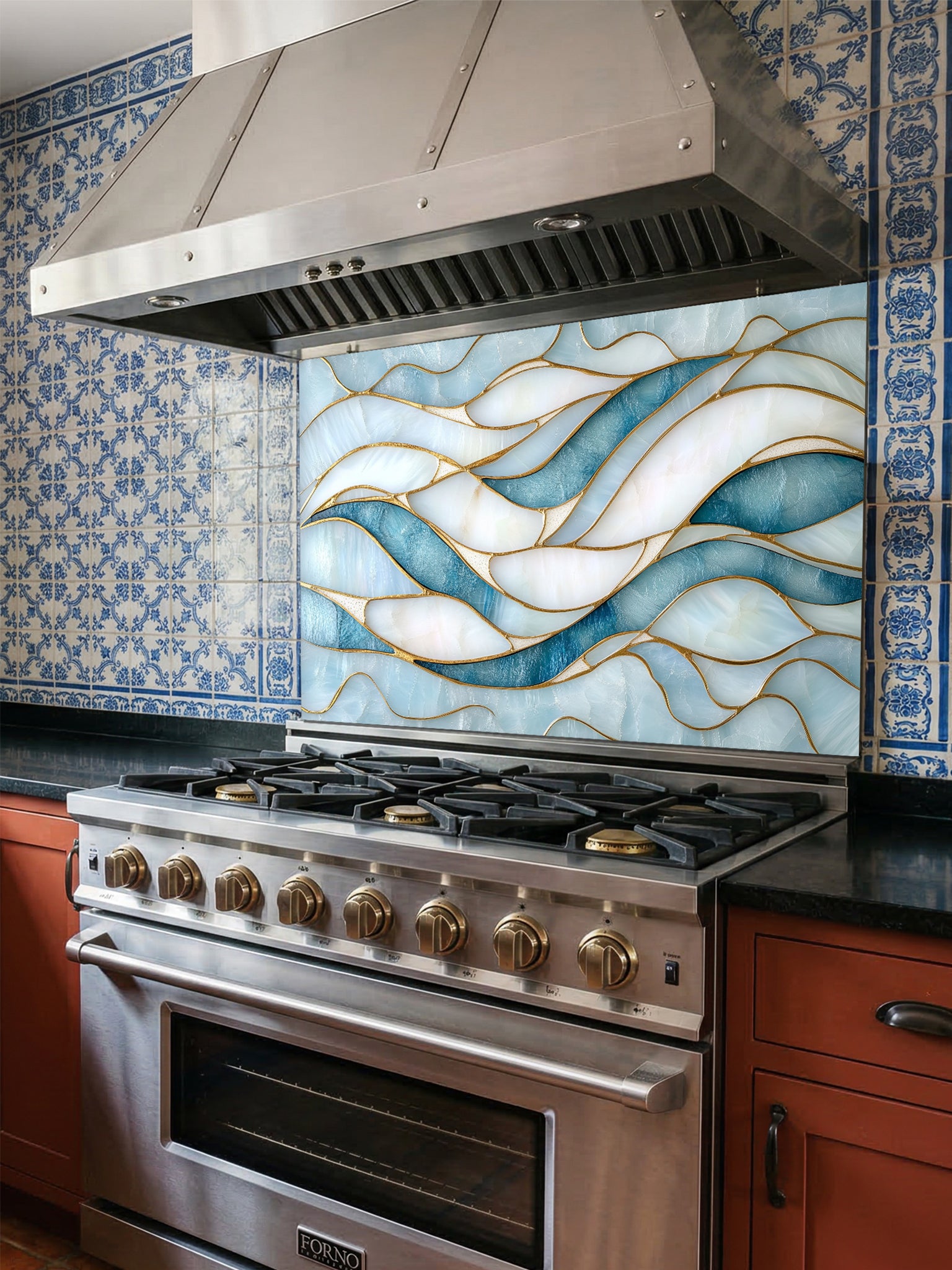 Tempered glass kitchen backsplash featuring a calming modern abstract wave design in faux stained glass with blue, teal, and pearlescent white sections separated by elegant gold lines, installed behind a modern stainless steel stove.