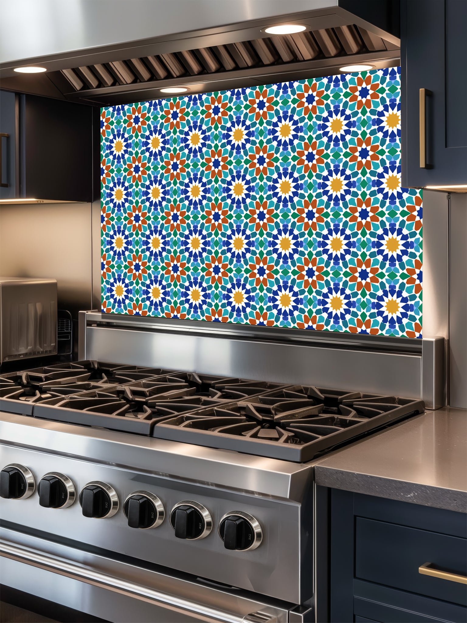 Stainless steel stove with a colorful geometric patterned backsplash