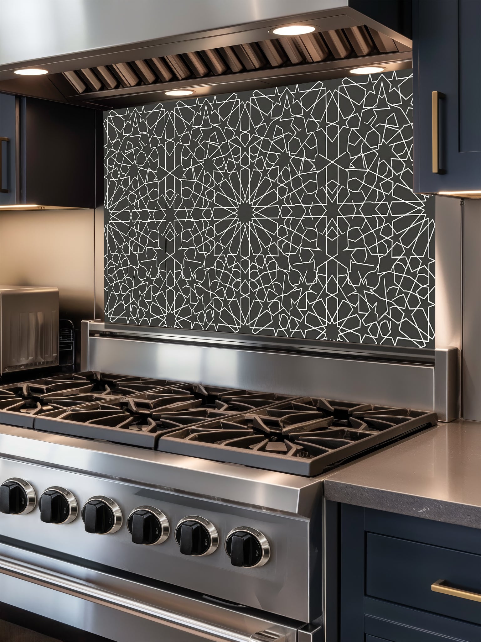 Stainless steel stove with decorative backsplash in a modern kitchen setting