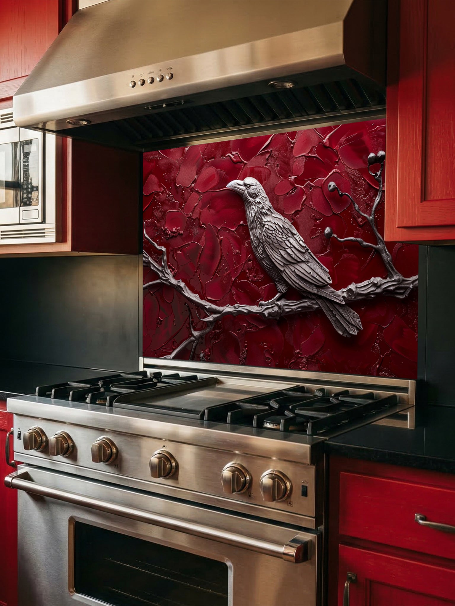 Tempered glass kitchen backsplash featuring a highly realistic 3D illusion of a sculpted metallic raven perched on a branch with berries against a heavily textured, thick impasto crimson red background, installed behind a modern black stove.