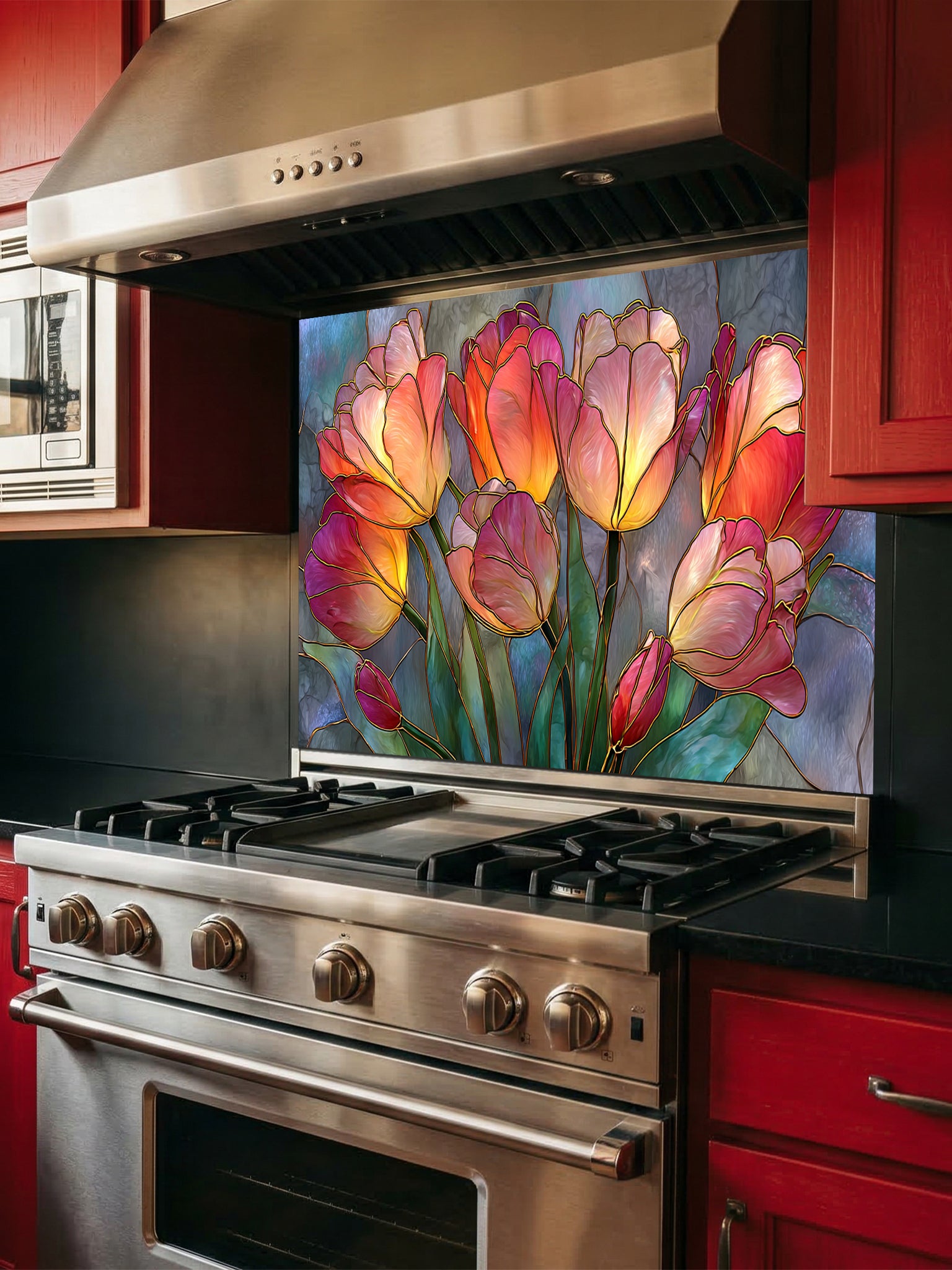 Stained glass style blooming tulips in vibrant red, orange, yellow, and pink on a textured blue background, UV printed on a smooth tempered glass kitchen backsplash, installed behind a modern stove.
