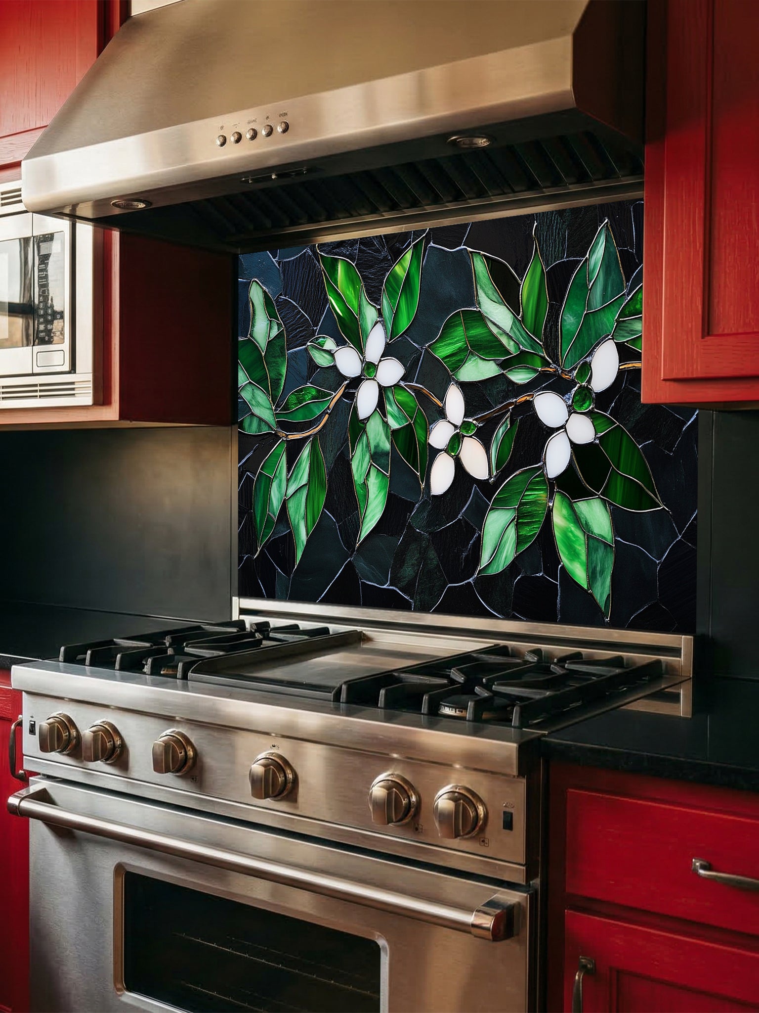 Tempered glass kitchen backsplash featuring a highly realistic 3D illusion of stained glass and cracked mosaic art showing delicate white blossoms and vibrant emerald green leaves gracefully sprawling across a dark, moody charcoal and black background, installed behind a modern black stove.
