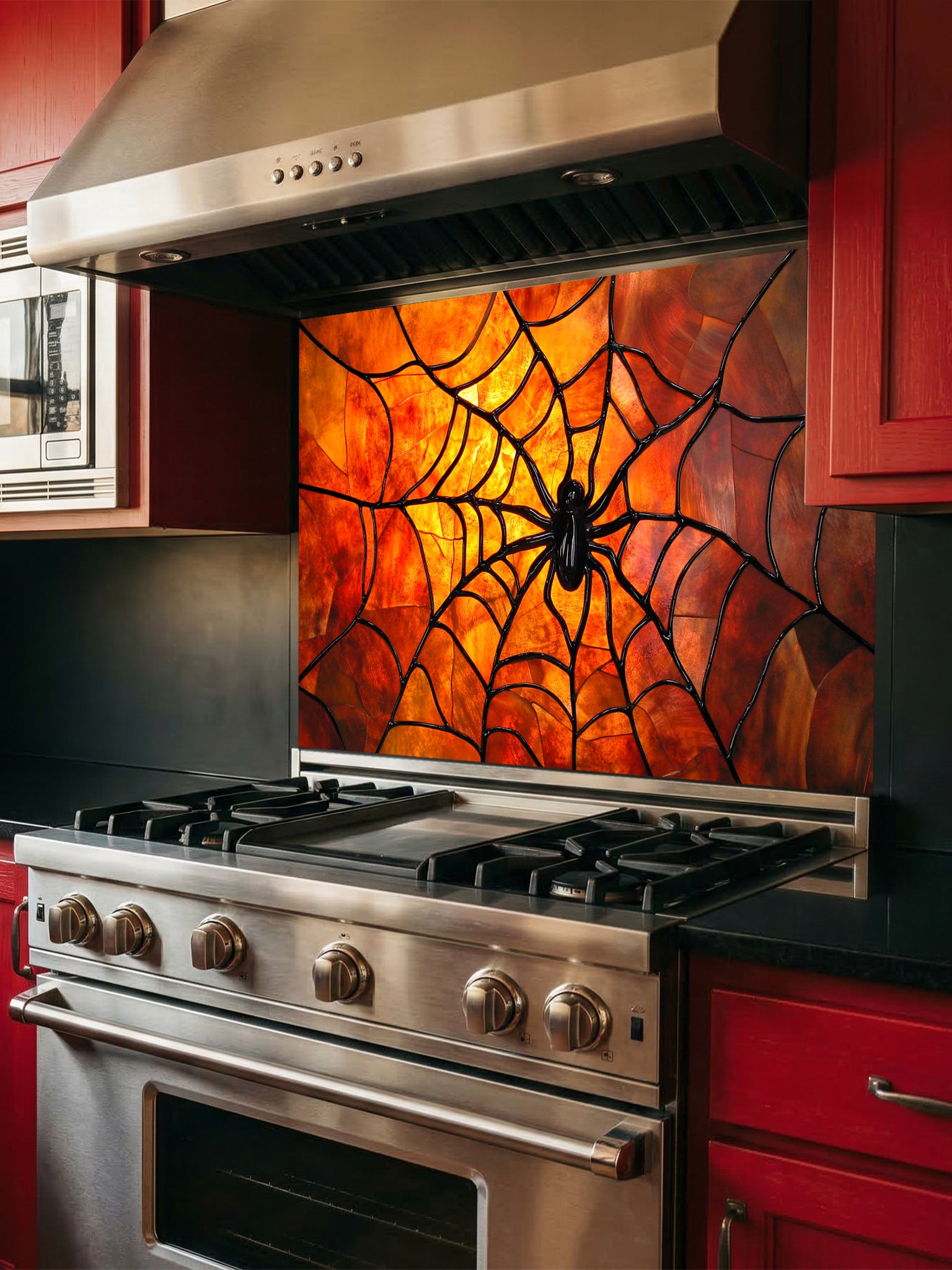 Tempered glass kitchen backsplash featuring a highly realistic 3D illusion of stained glass art showing a black spider in the center of a glowing amber and orange spider web, installed behind a modern black stove.