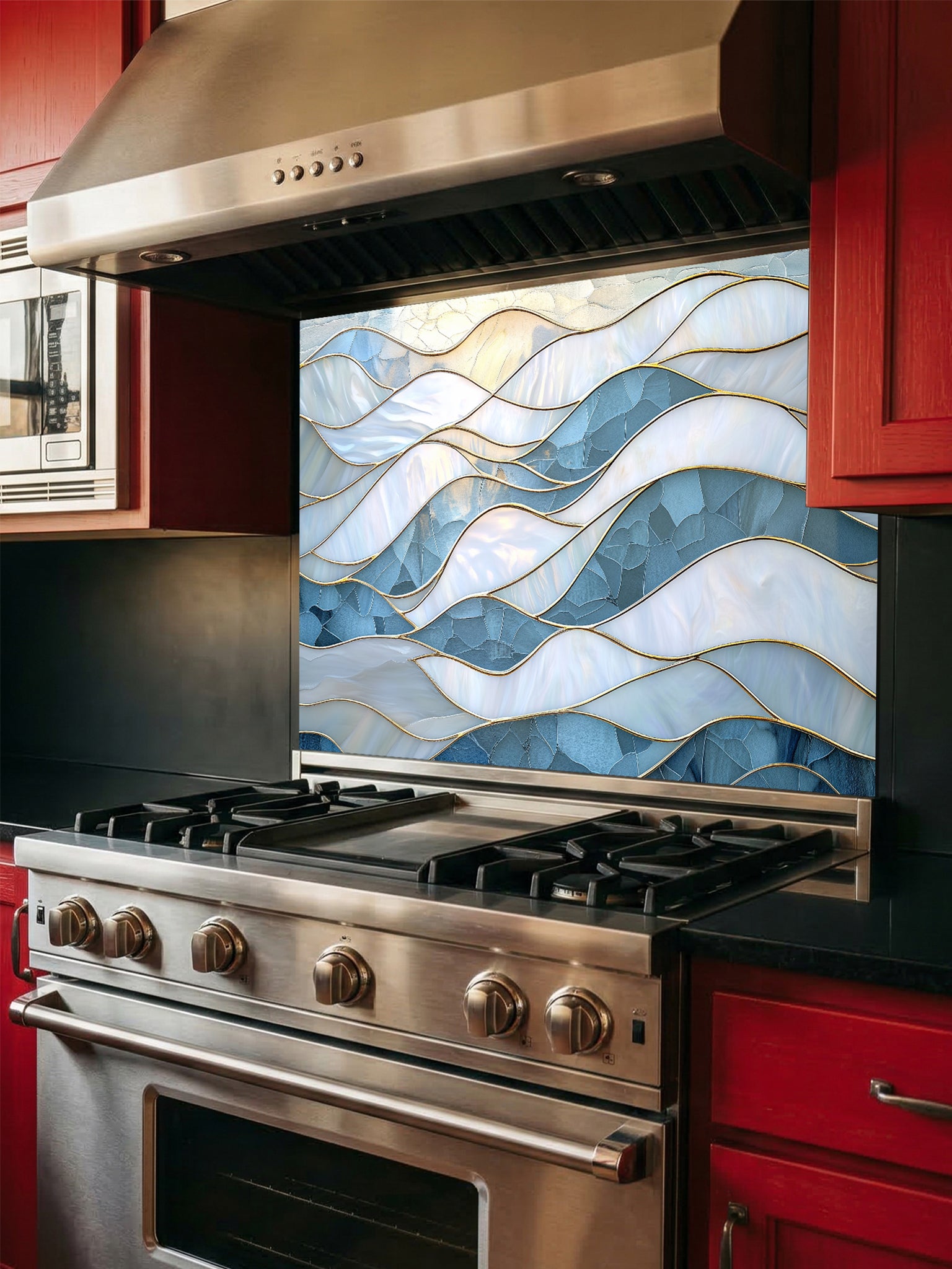 Tempered glass kitchen backsplash featuring a serene faux stained glass design of layered, flowing waves in icy blue and pearlescent white, separated by elegant gold outlines, installed behind a modern stainless steel stove.
