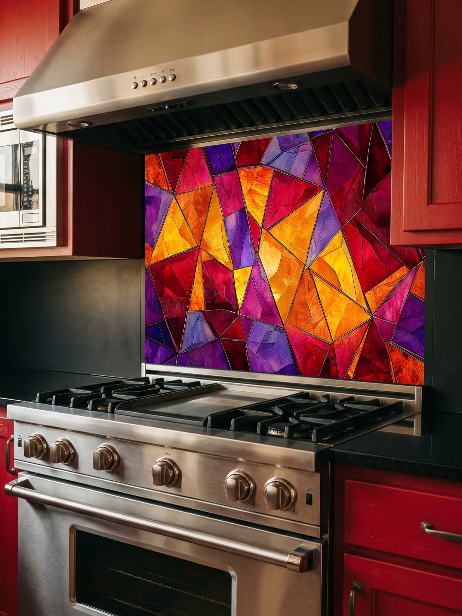 Tempered glass kitchen backsplash featuring a highly realistic illusion of abstract geometric stained glass with asymmetrical shards in vibrant, warm jewel tones of ruby red, magenta, amethyst, and amber, installed behind a modern black stove.